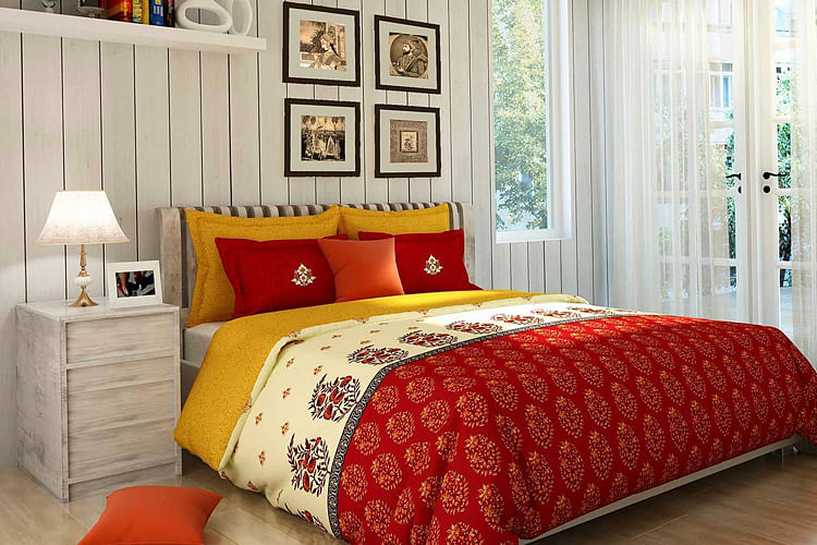 Bedroom,Bed sheet,Bed,Bedding,Furniture,Room,Orange,Red,Bed frame,Duvet cover