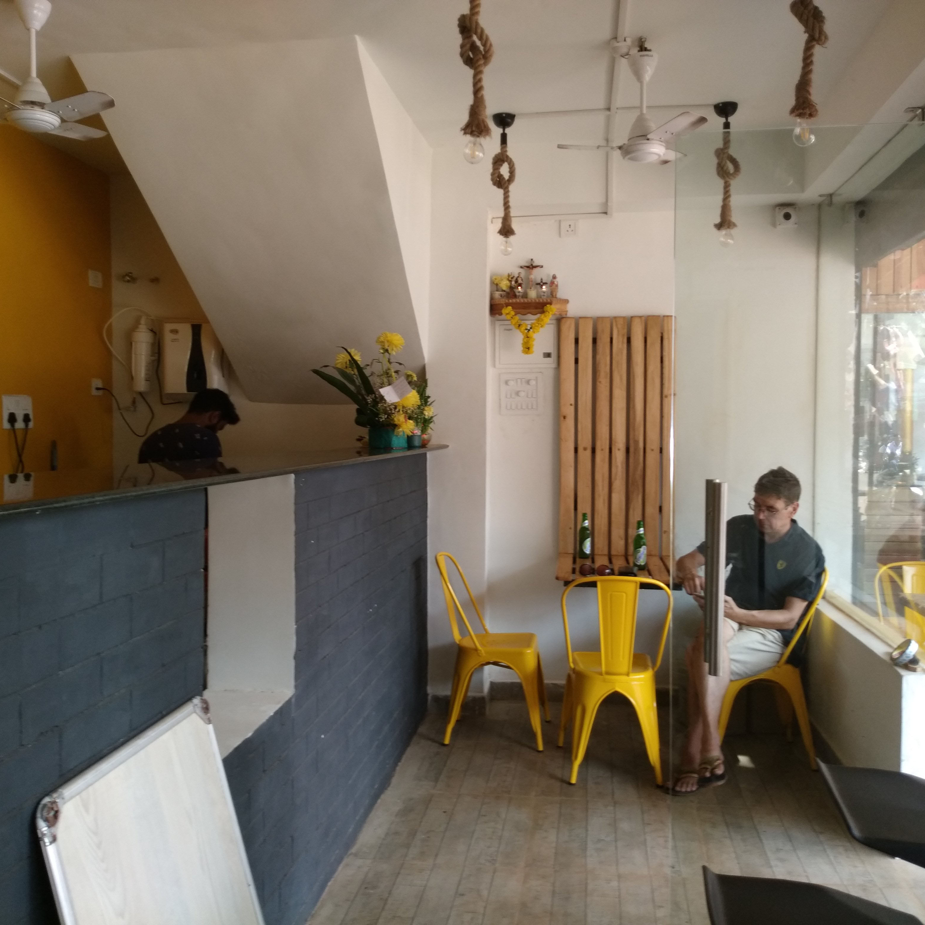 Room,Yellow,Interior design,Ceiling,Property,Dining room,Building,Furniture,Table,Architecture