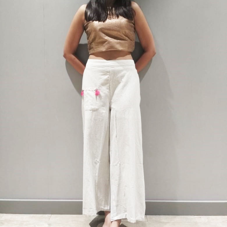 Clothing,White,Waist,Leg,Shoulder,Trousers,Neck,Dress,Joint,Abdomen