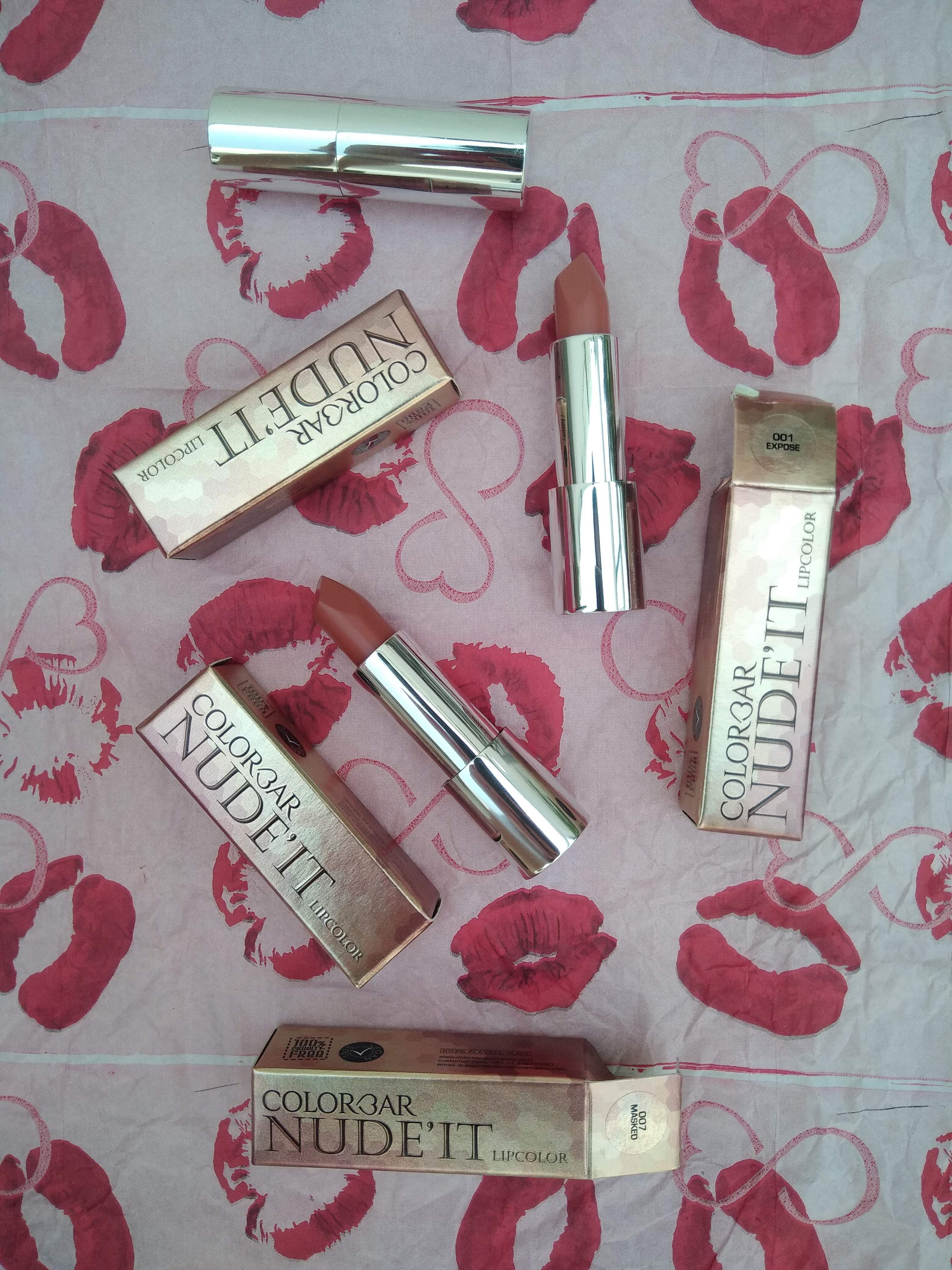 Pink,Lipstick,Lip care,Lip gloss,Cosmetics,Lip,Material property,Font,Gloss