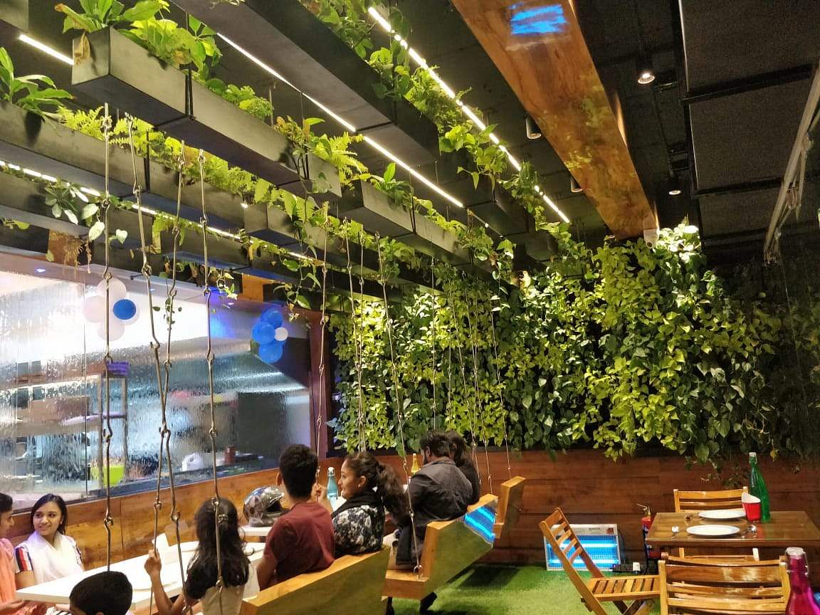 Building,Architecture,Design,Organism,Restaurant,Interior design,Tree,Leisure,Room,Plant