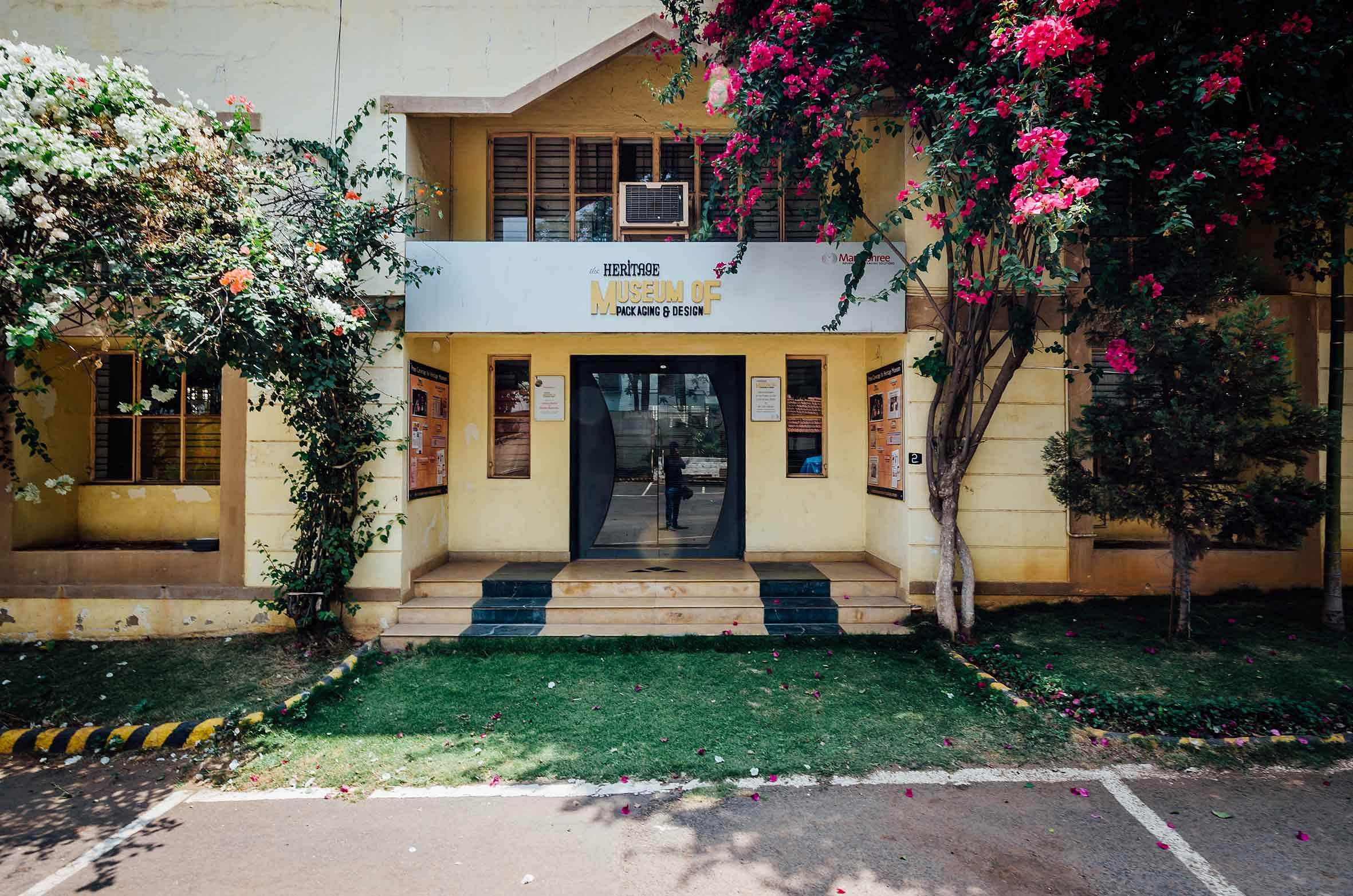 Property,House,Home,Building,Real estate,Architecture,Residential area,Pink,Tree,Neighbourhood