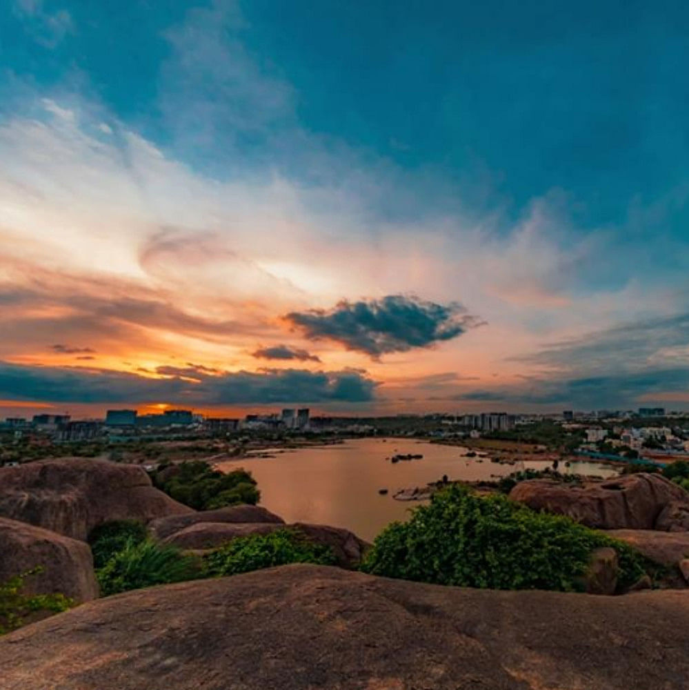 Sky,Nature,Natural landscape,Cloud,Water,Sunset,Morning,Rock,Evening,River