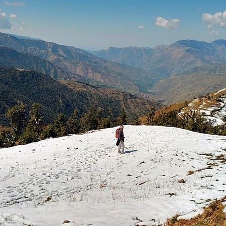 Mountainous landforms,Mountain,Snow,Sky,Wilderness,Mountain range,Winter,Ridge,Hill,Tree
