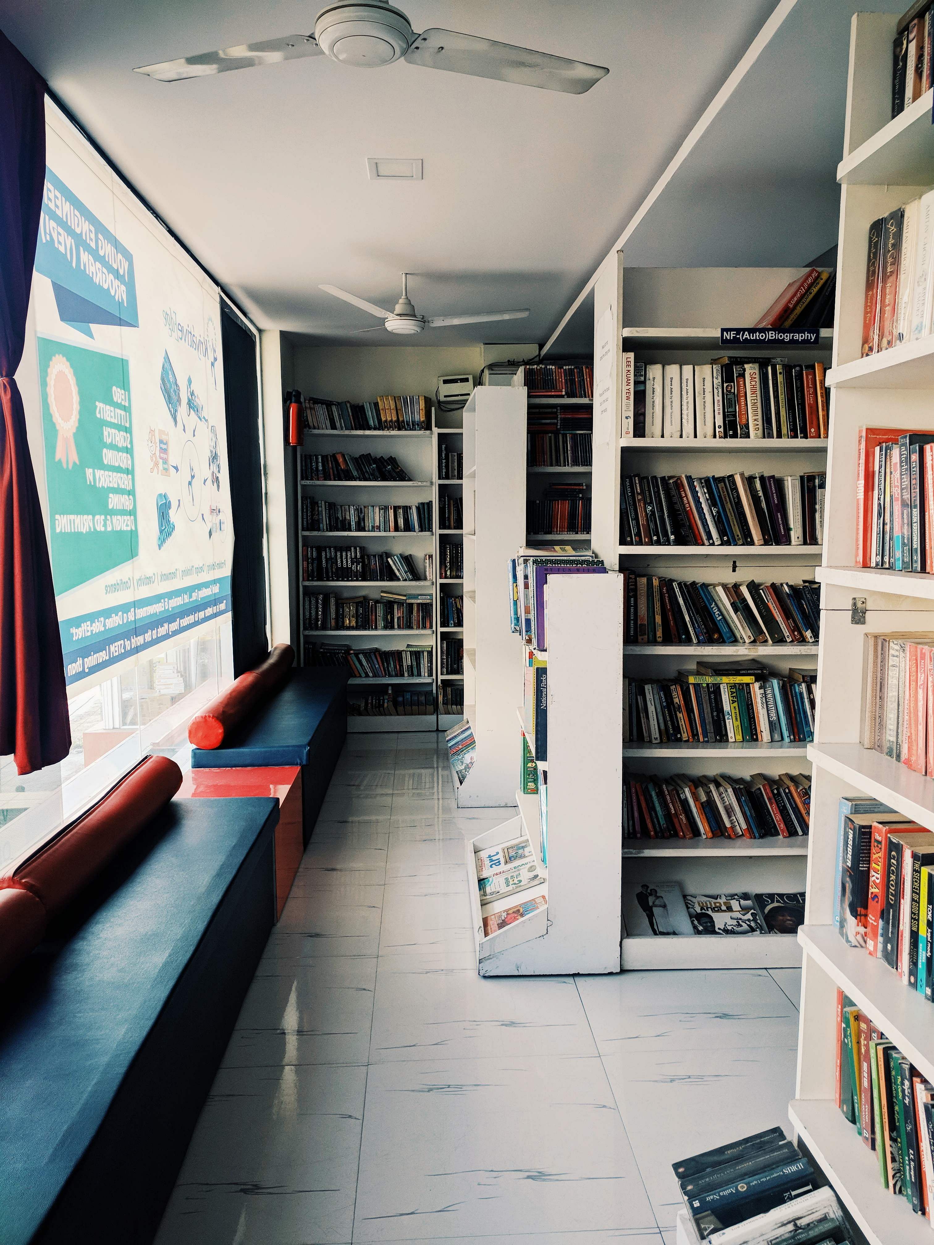 Shelf,Shelving,Bookcase,Building,Library,Public library,Room,Interior design,Furniture,Architecture