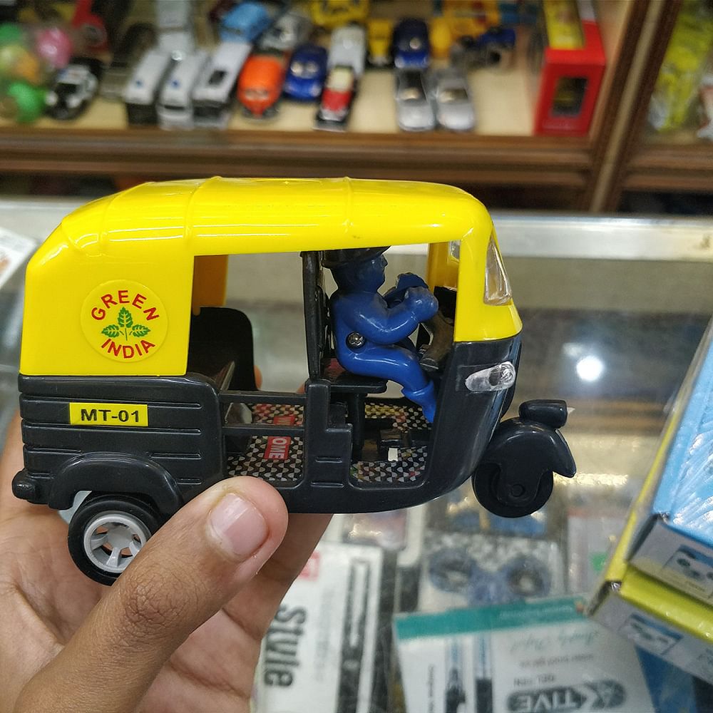 Vehicle,Transport,Mode of transport,Car,Toy,Rickshaw,Model car,Taxi,Public transport,City car