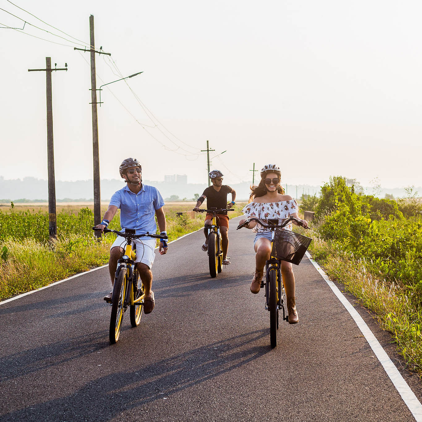 Cycling,Bicycle,Vehicle,Road cycling,Outdoor recreation,Recreation,Road,Mode of transport,Transport,Yellow