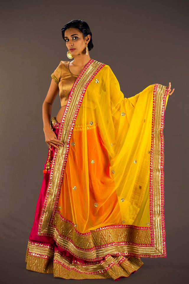 Clothing,Fashion model,Orange,Sari,Yellow,Formal wear,Peach,Fashion design,Textile,Magenta