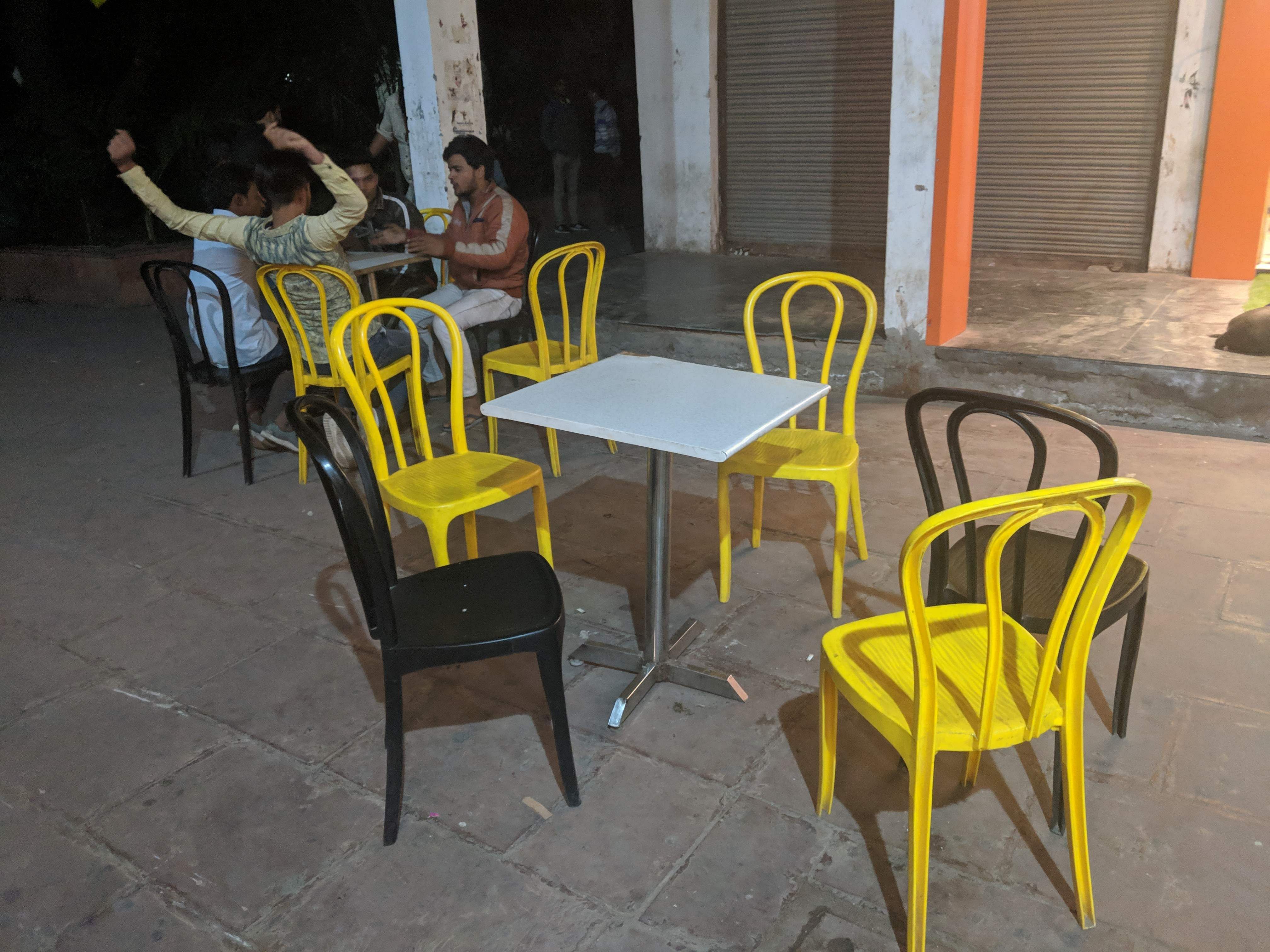 Furniture,Chair,Table,Yellow,Outdoor table,Room,Outdoor furniture