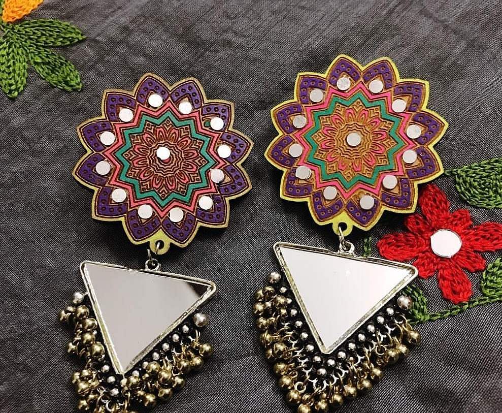 Jewellery,Fashion accessory,Brooch,Ornament,Earrings,Metal