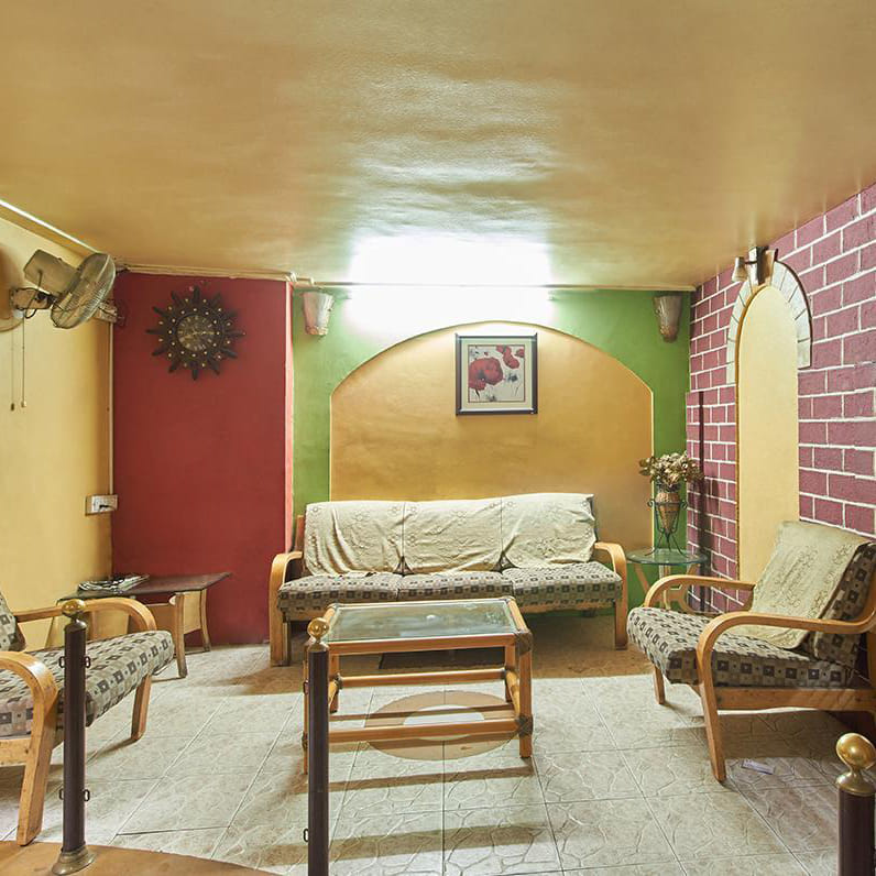 Room,Furniture,Green,Interior design,Property,Ceiling,Yellow,Building,Living room,Wall