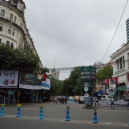 Town,Sky,Street,Urban area,Landmark,Architecture,Transport,City,Neighbourhood,Road