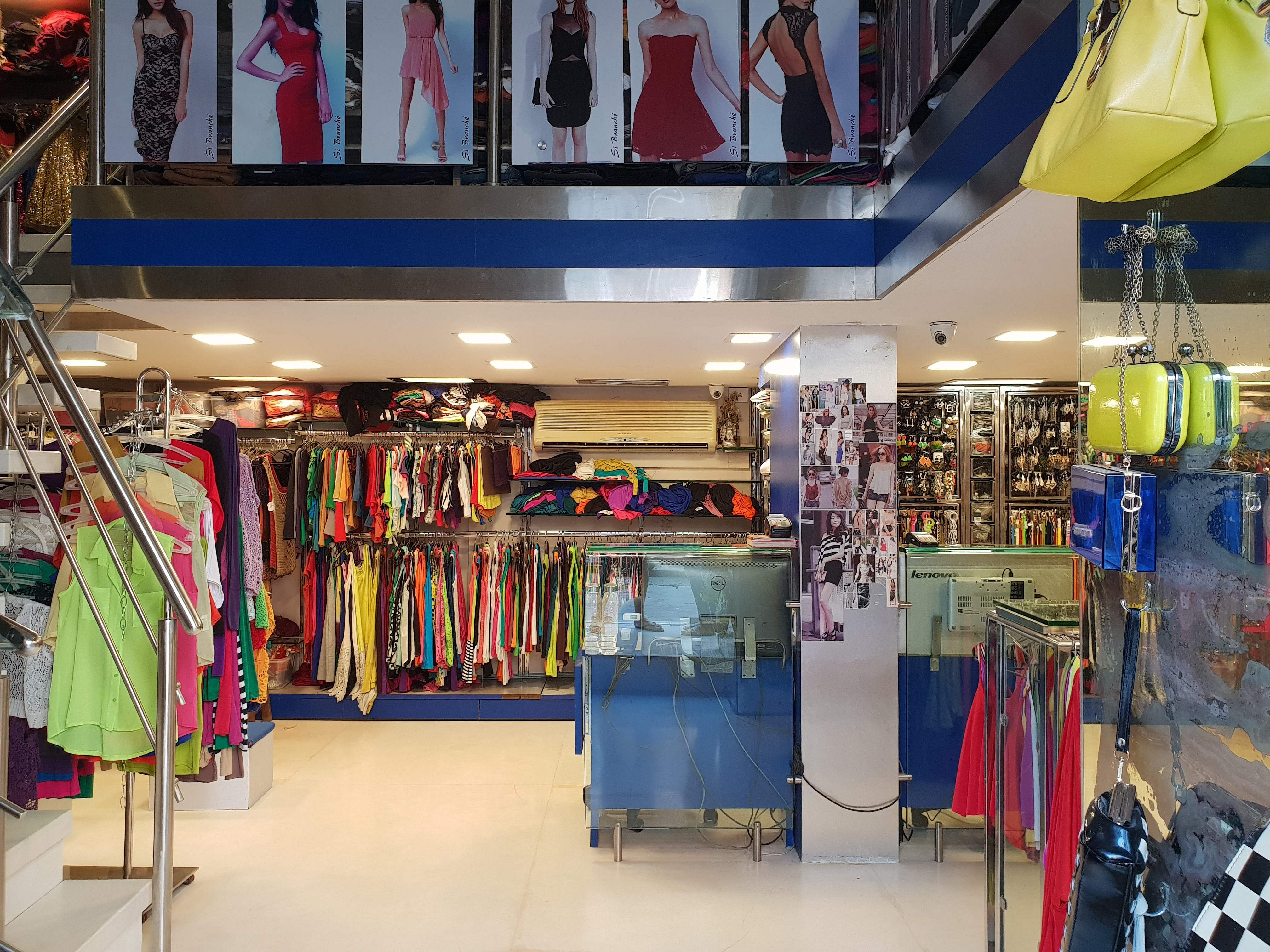 Outlet store,Boutique,Retail,Building,Shopping,Shopping mall,Marketplace,Outerwear,Room,Textile