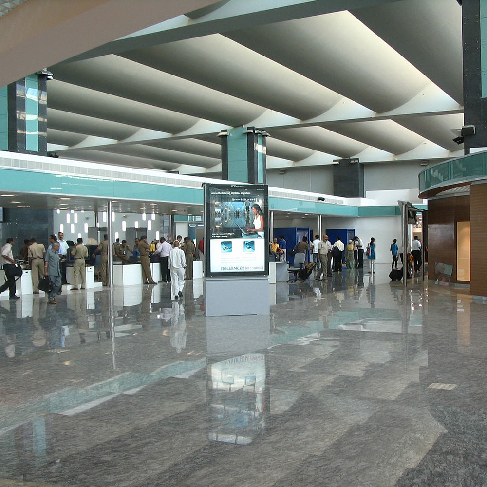 Building,Airport,Lobby,Airport terminal,Architecture,Infrastructure,Metropolitan area,Interior design,Flooring,Floor