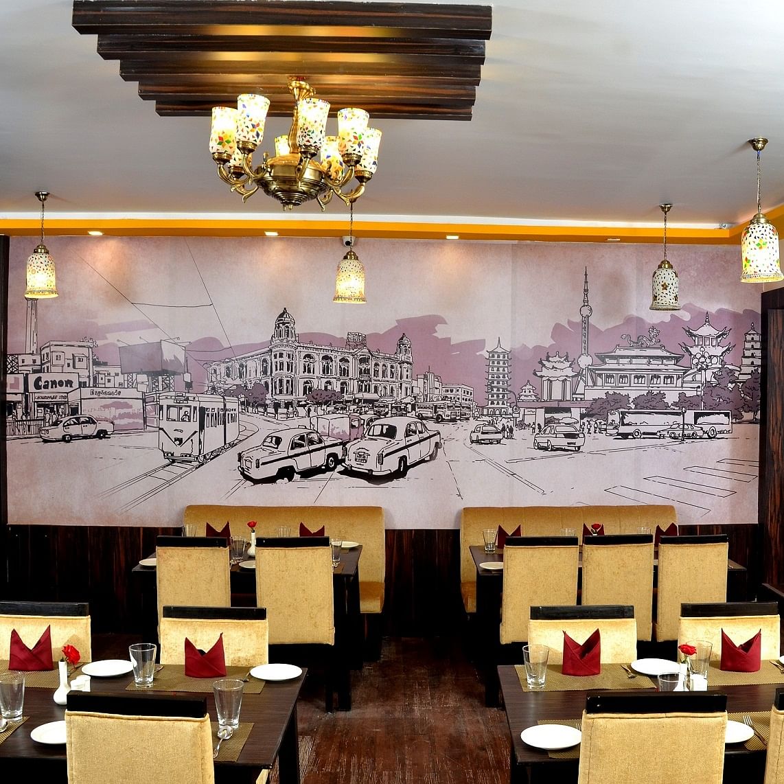 Restaurant,Wall,Interior design,Lighting,Room,Building,Ceiling,Table,Architecture,Dining room