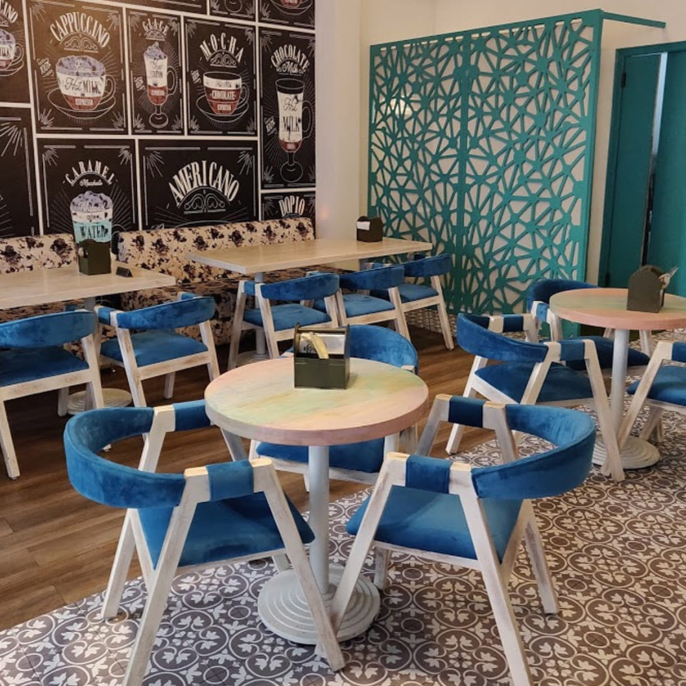 Blue,Room,Furniture,Table,Turquoise,Interior design,Chair,Dining room,Restaurant,Kitchen & dining room table