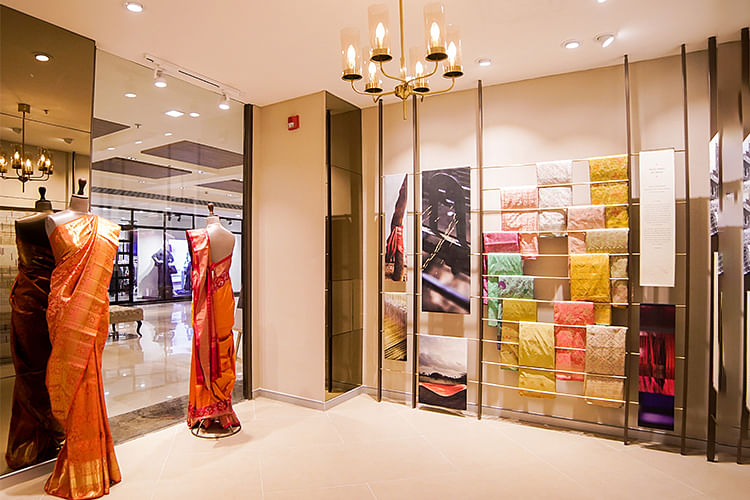 Boutique,Outlet store,Interior design,Room,Building,Retail,Display case,Ceiling,Shopping mall