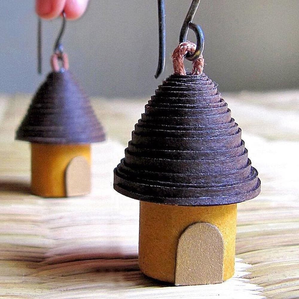 Tree,Cone,Wood,Ornament,Finial,Birdhouse,Fashion accessory,House,Birdhouse,Metal