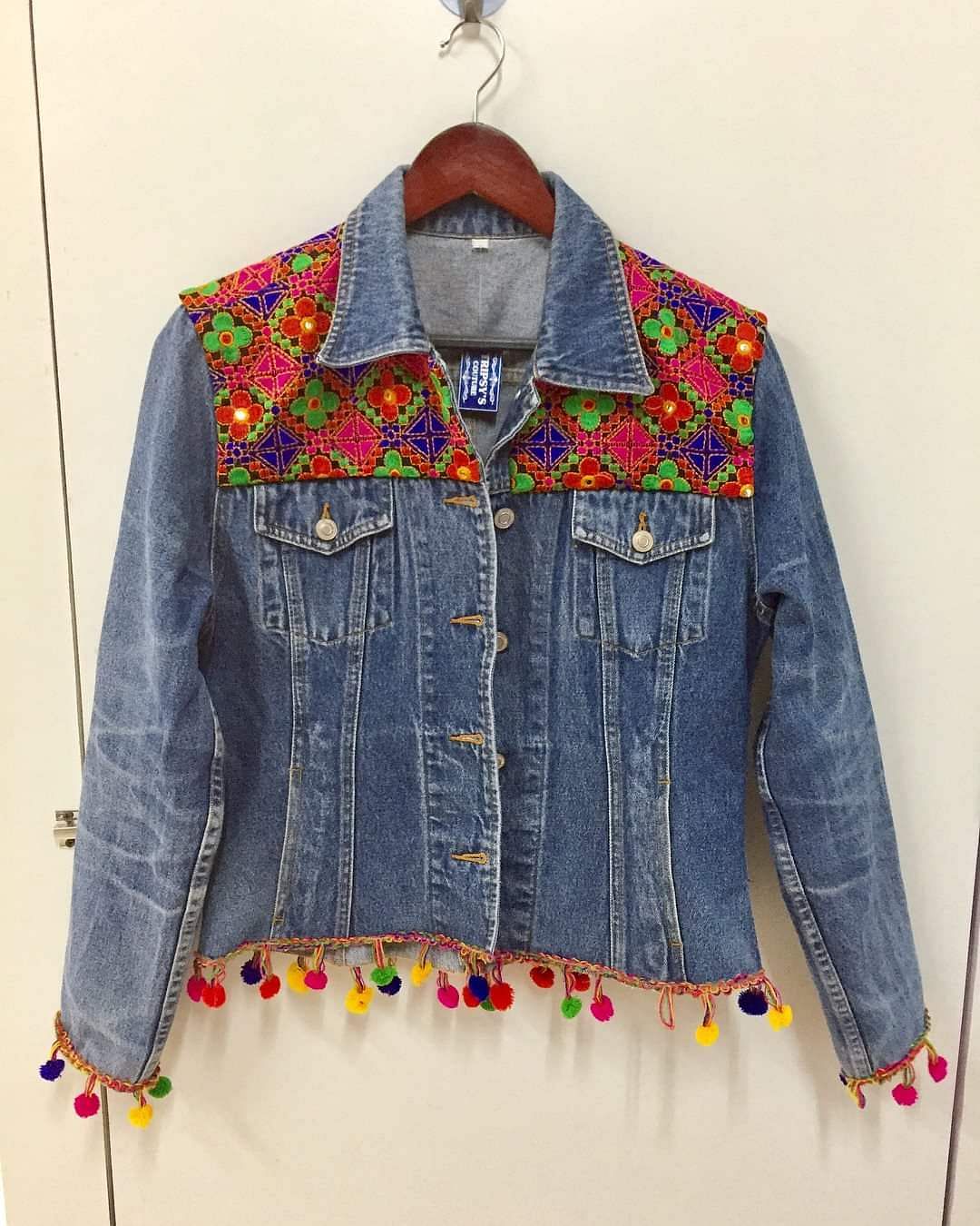 Clothing,Denim,Outerwear,Jeans,Jacket,Clothes hanger,Sleeve,Textile,Fashion,Top