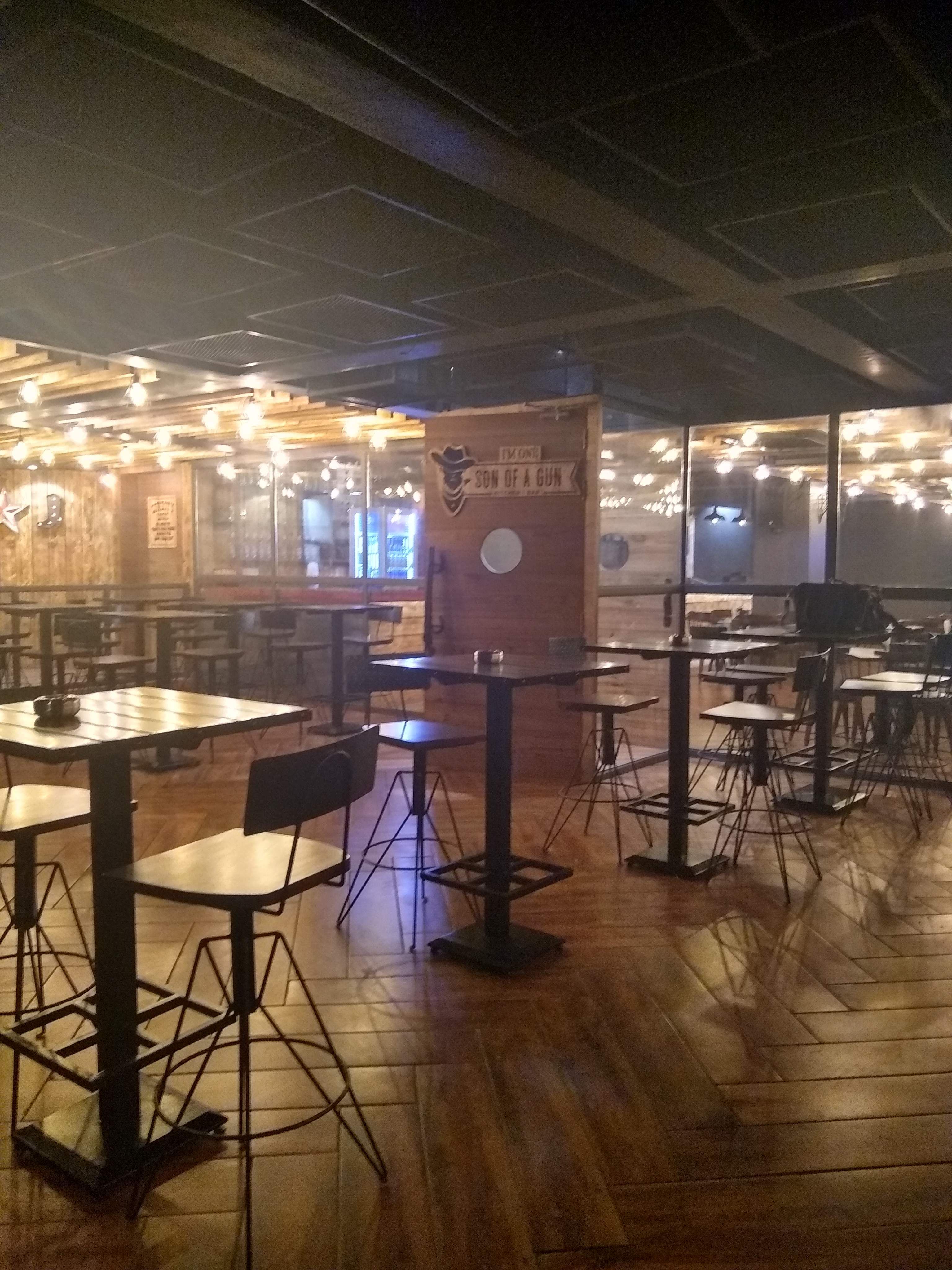 Restaurant,Lighting,Building,Table,Floor,Flooring,Furniture,Architecture,Room,Interior design