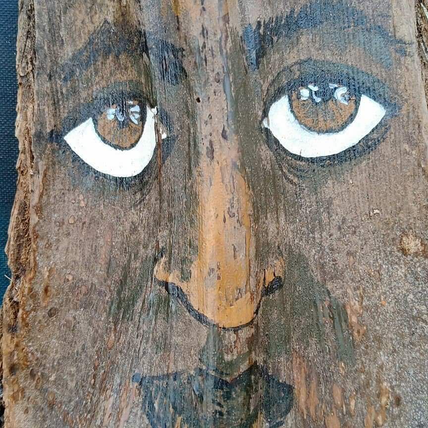 Face,Eye,Wood,Art,Nose,Head,Tree,Organ,Cheek,Visual arts