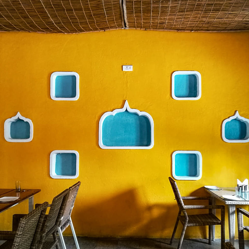 Yellow,Turquoise,Blue,Wall,Orange,Green,Room,Ceiling,Interior design,Furniture