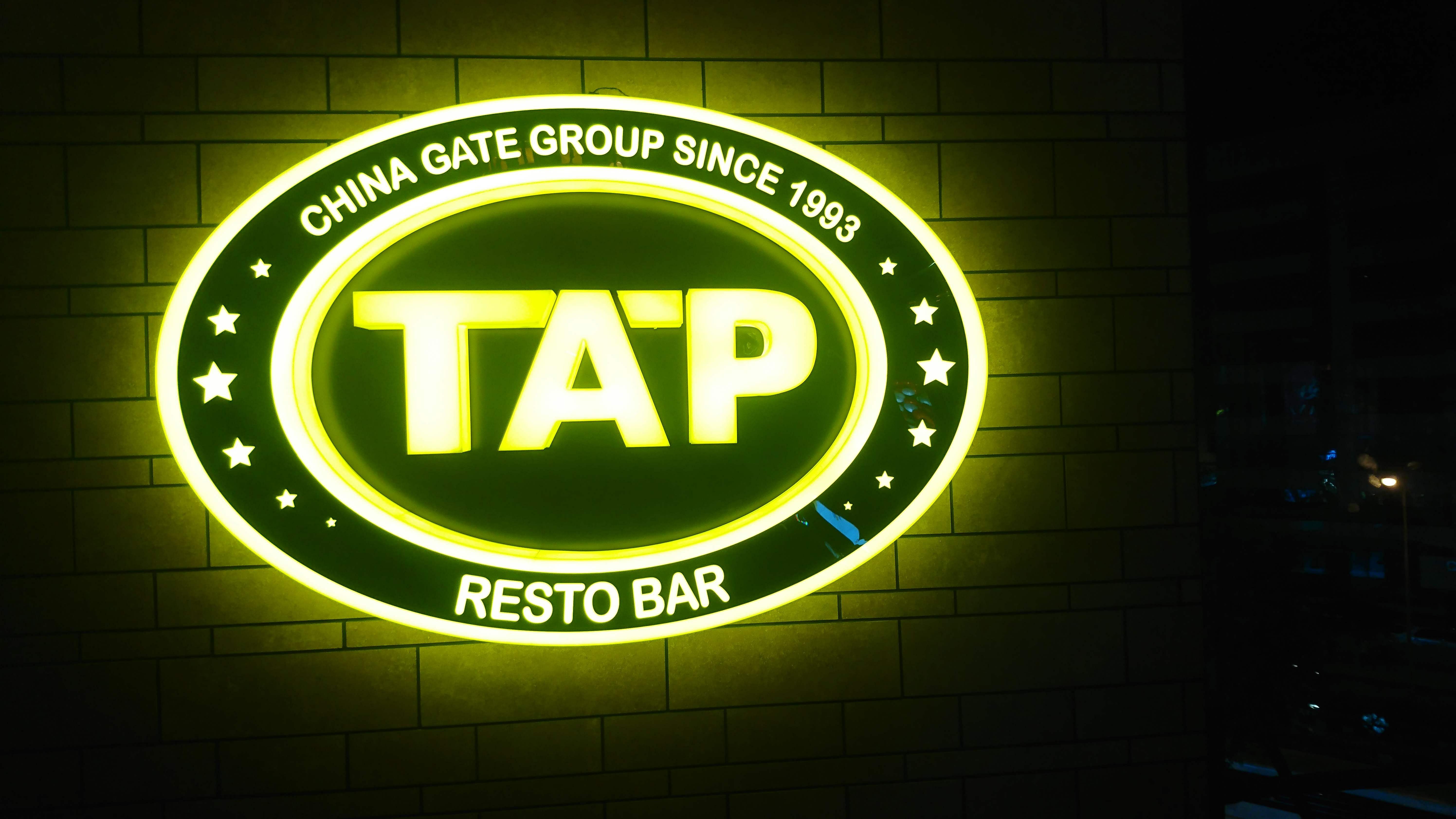 Green,Logo,Electronic signage,Signage,Font,Graphics,Neon sign,Emblem,Trademark,Brand