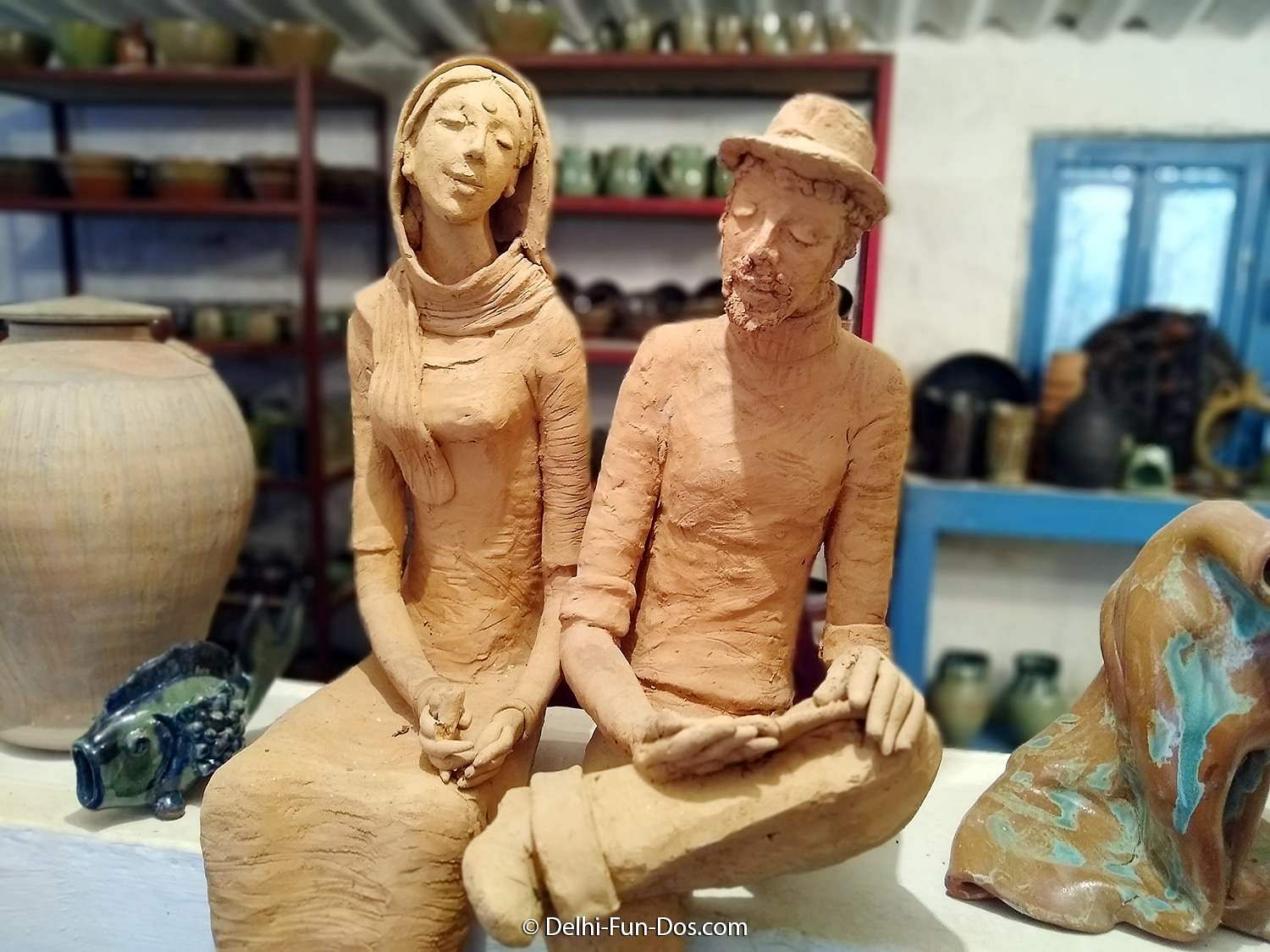 Sculpture,Figurine,Art,Carving,Sculptor,Nativity scene,Chainsaw carving,Statue,Classical sculpture,Ceramic