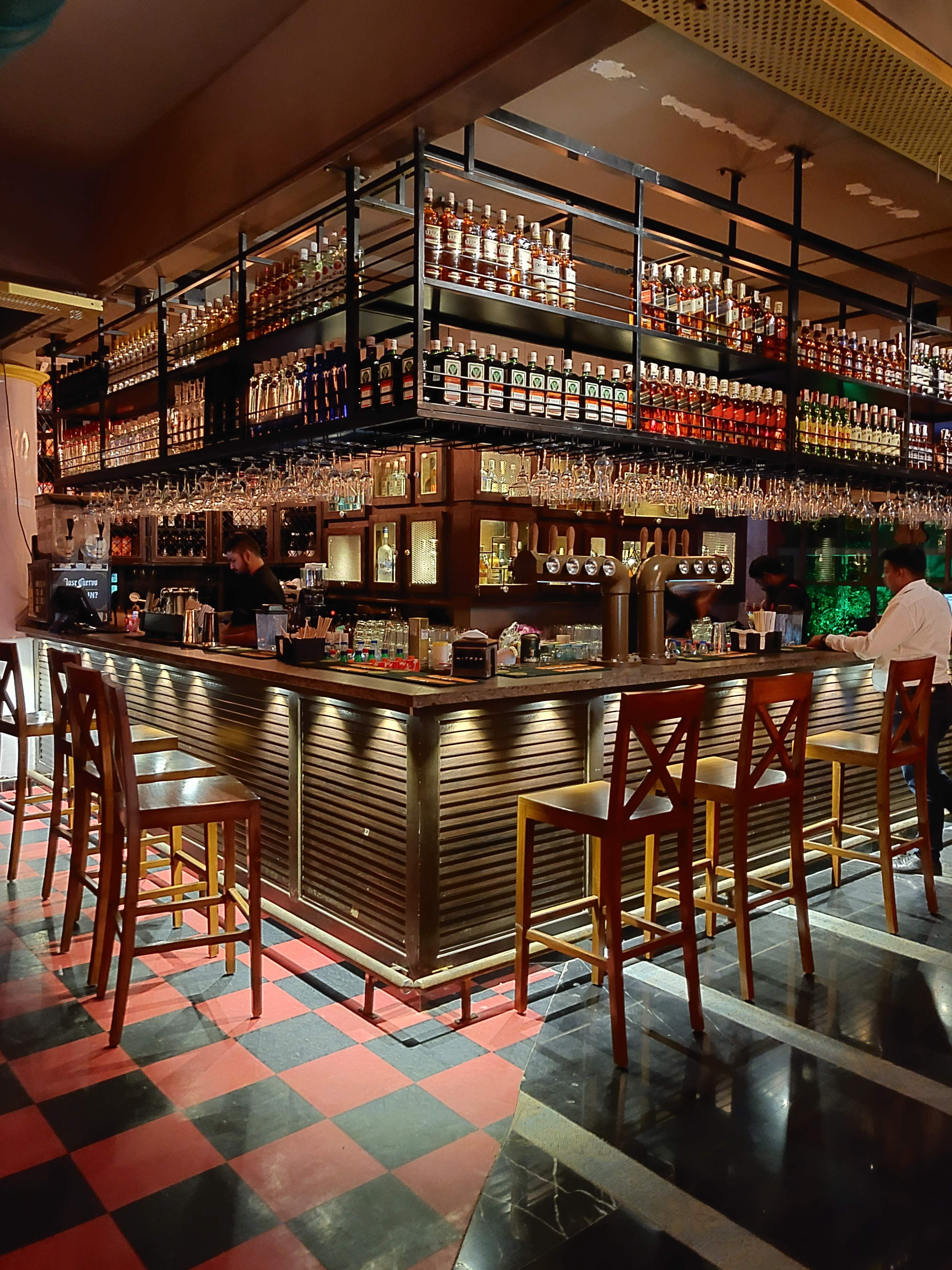 Building,Interior design,Bar,Pub,Furniture,Table,Restaurant,Tavern