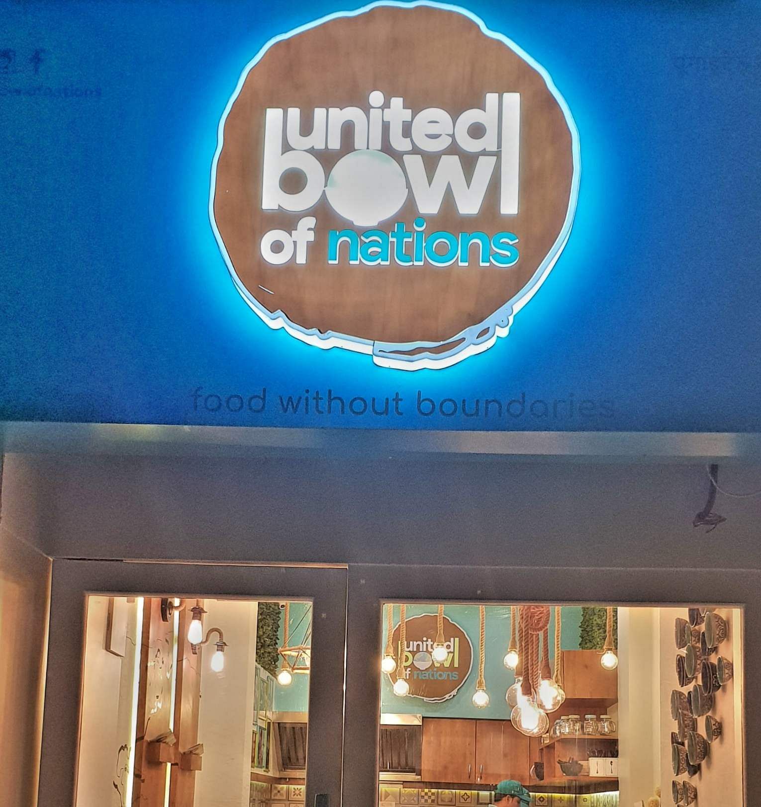 Blue,Turquoise,Font,Ceiling,Signage,Building,Nightlight