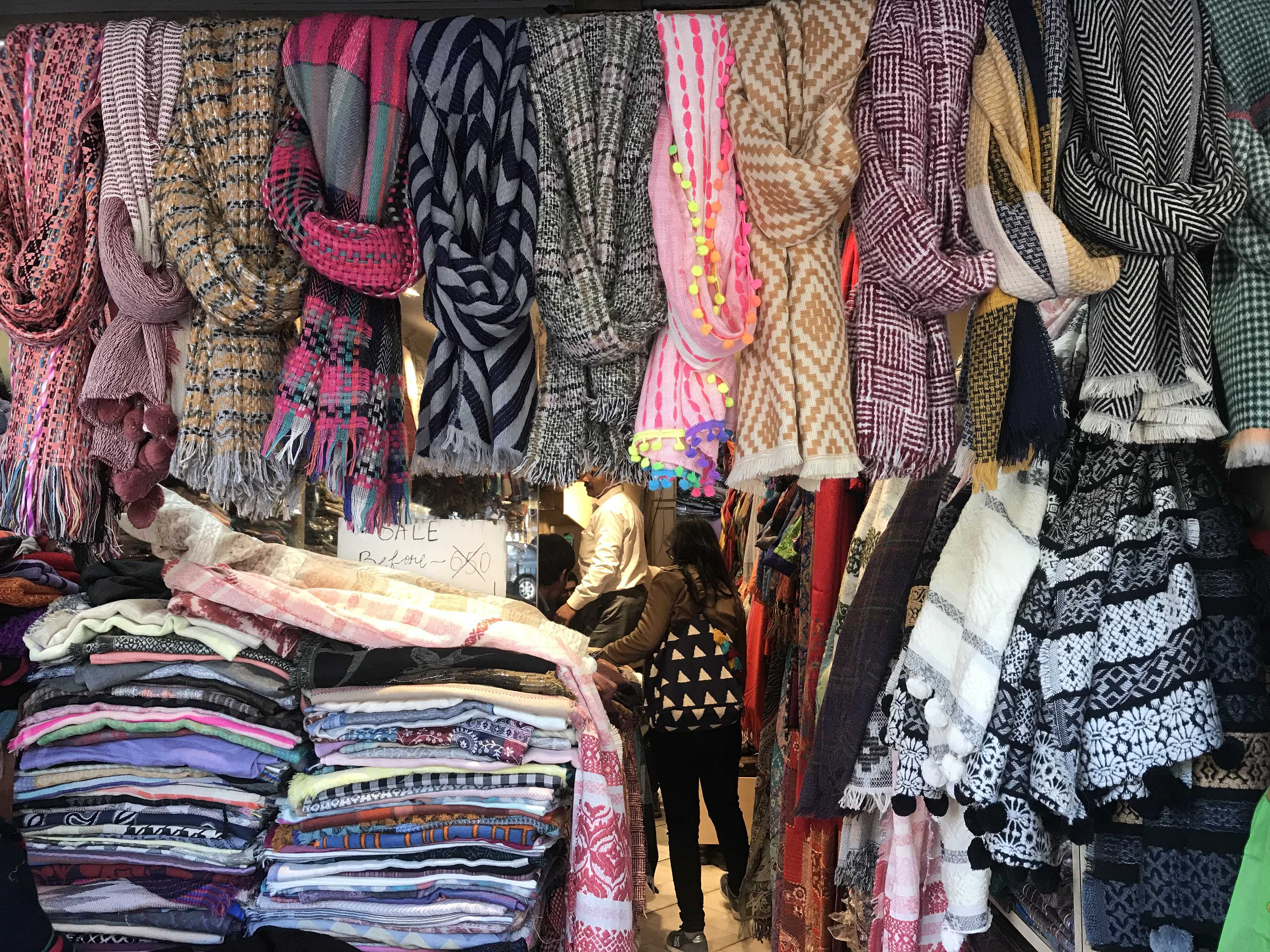 Clothing,Pink,Bazaar,Public space,Boutique,Market,Textile,Selling,Wool,Room