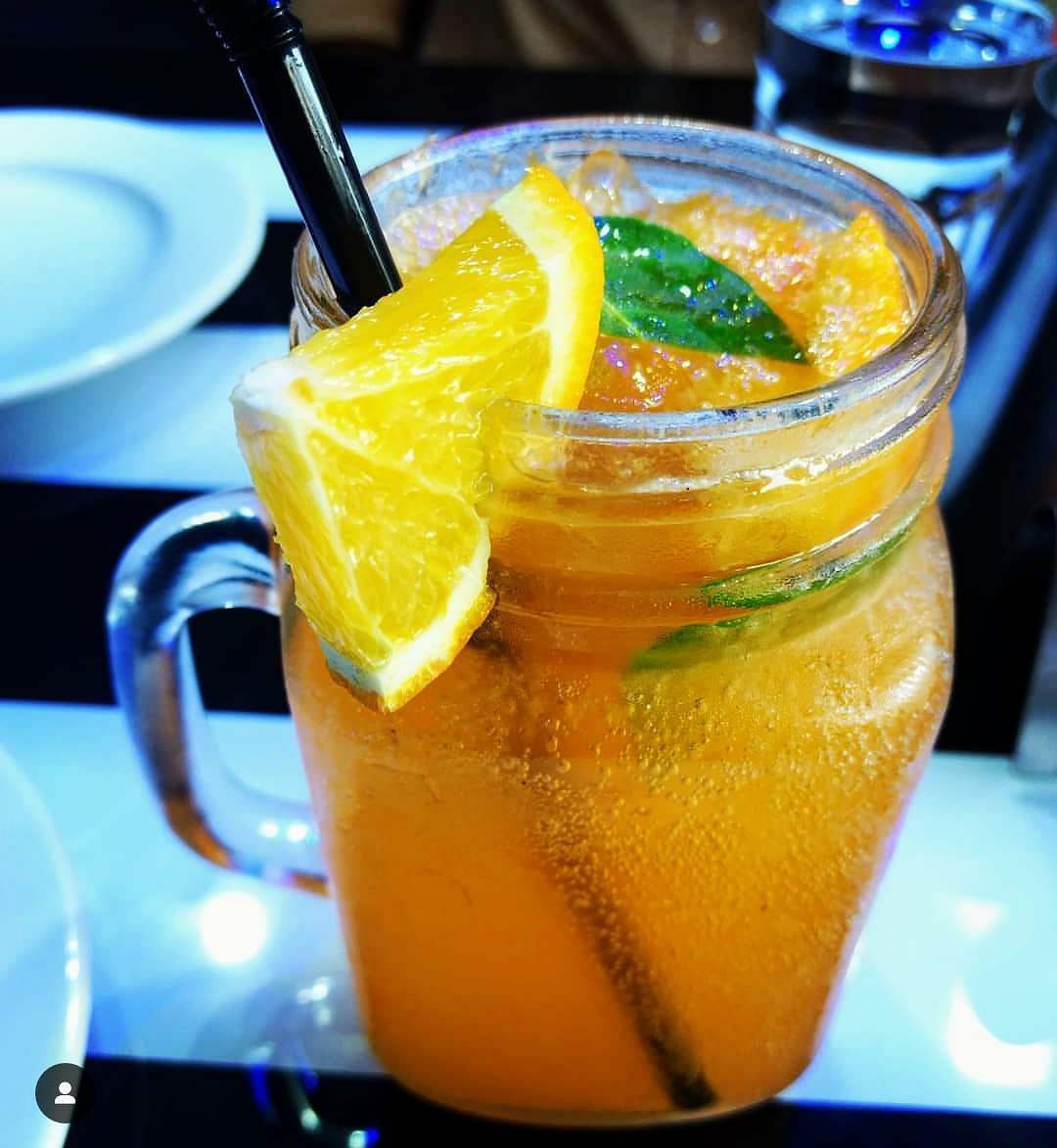 Drink,Juice,Non-alcoholic beverage,Orange drink,Arnold palmer,Mai tai,Food,Long island iced tea,Cocktail garnish,Sour