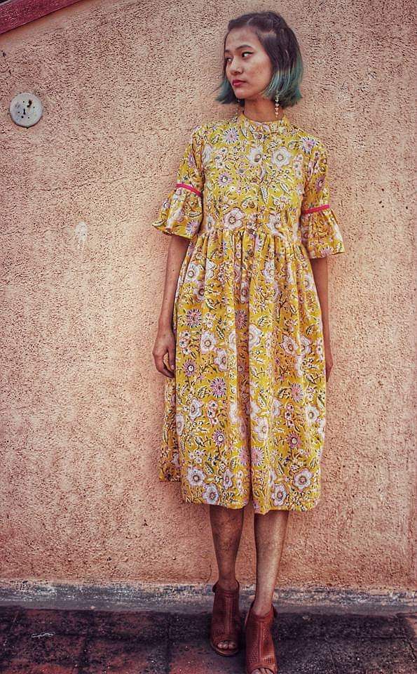 Clothing,Yellow,Dress,Day dress,Fashion,Sleeve,Fashion model,Pattern,Pattern,Visual arts