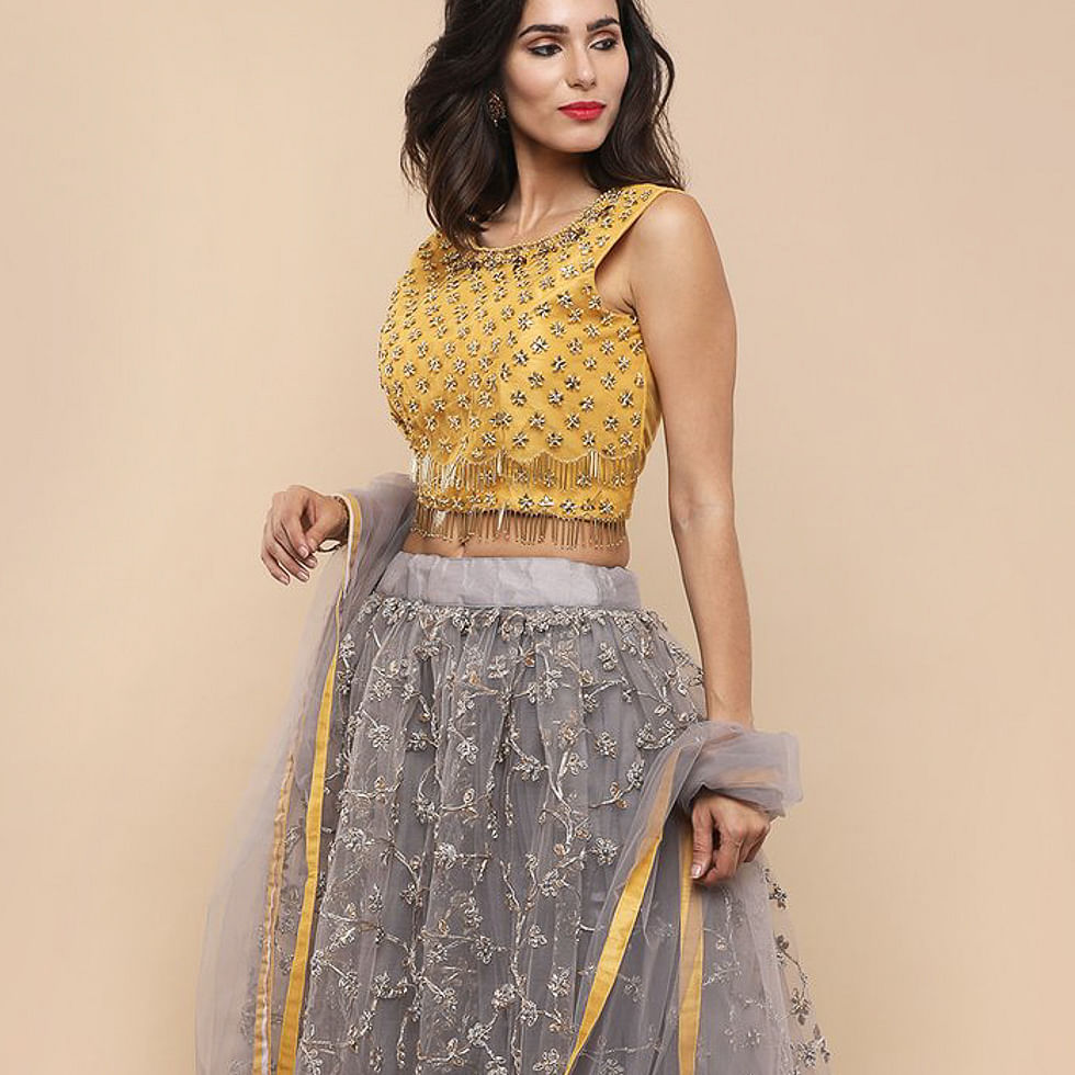 Clothing,Fashion model,Waist,Dress,Yellow,Photo shoot,Fashion,Neck,Formal wear,Crop top