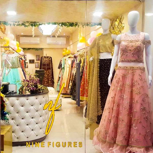 Boutique,Clothing,Dress,Yellow,Formal wear,Fashion,Retail,Gown,Room,Cocktail dress