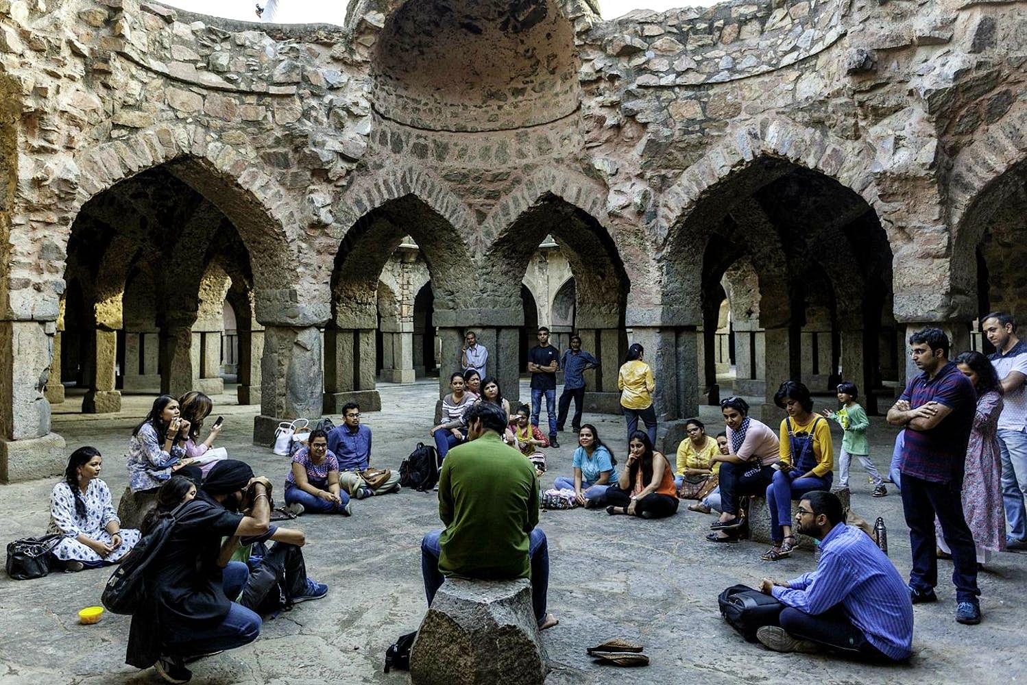 People,Holy places,Tourism,Architecture,Arch,History,Temple,Sitting,Building,Vacation