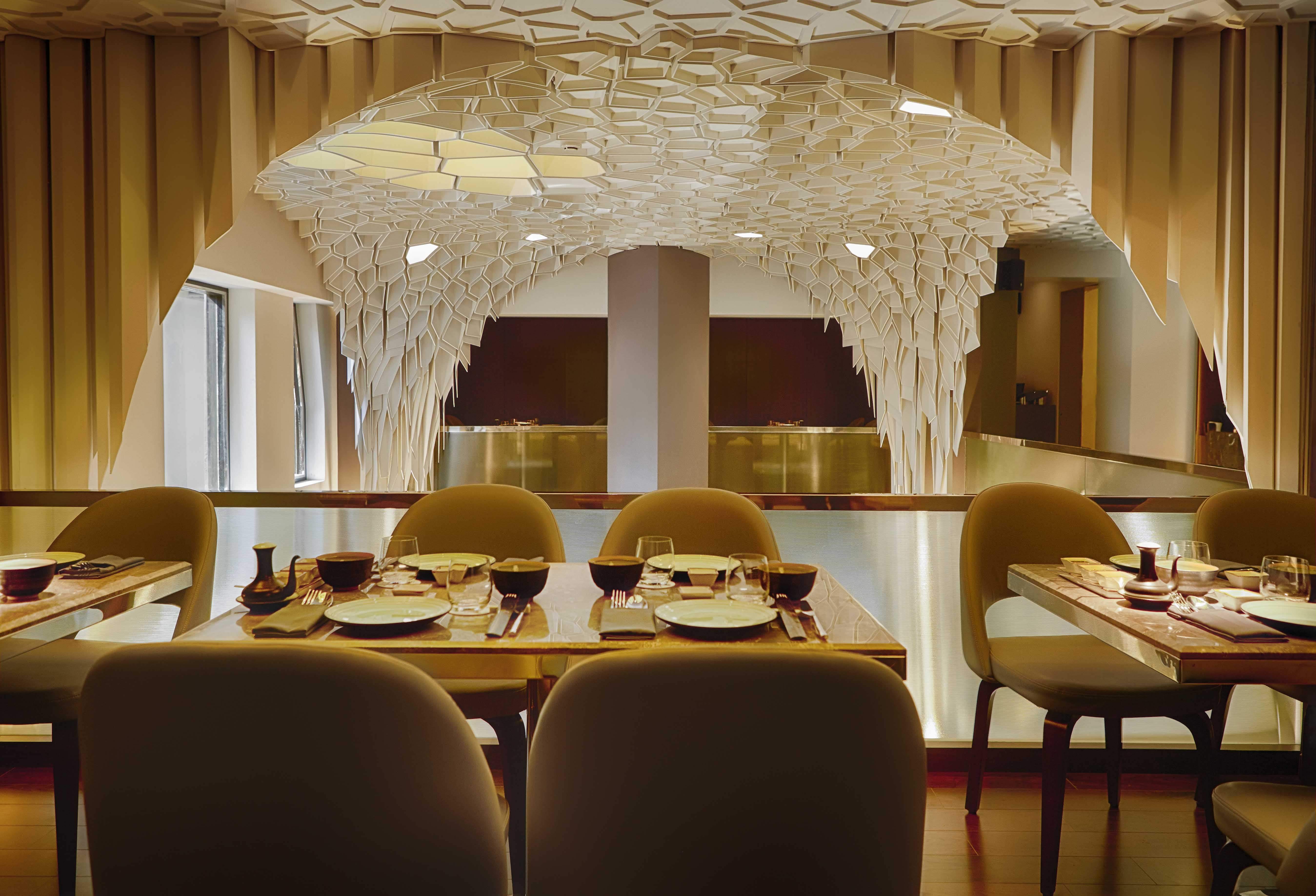 Room,Interior design,Restaurant,Lighting,Building,Architecture,Yellow,Function hall,Ceiling,Furniture