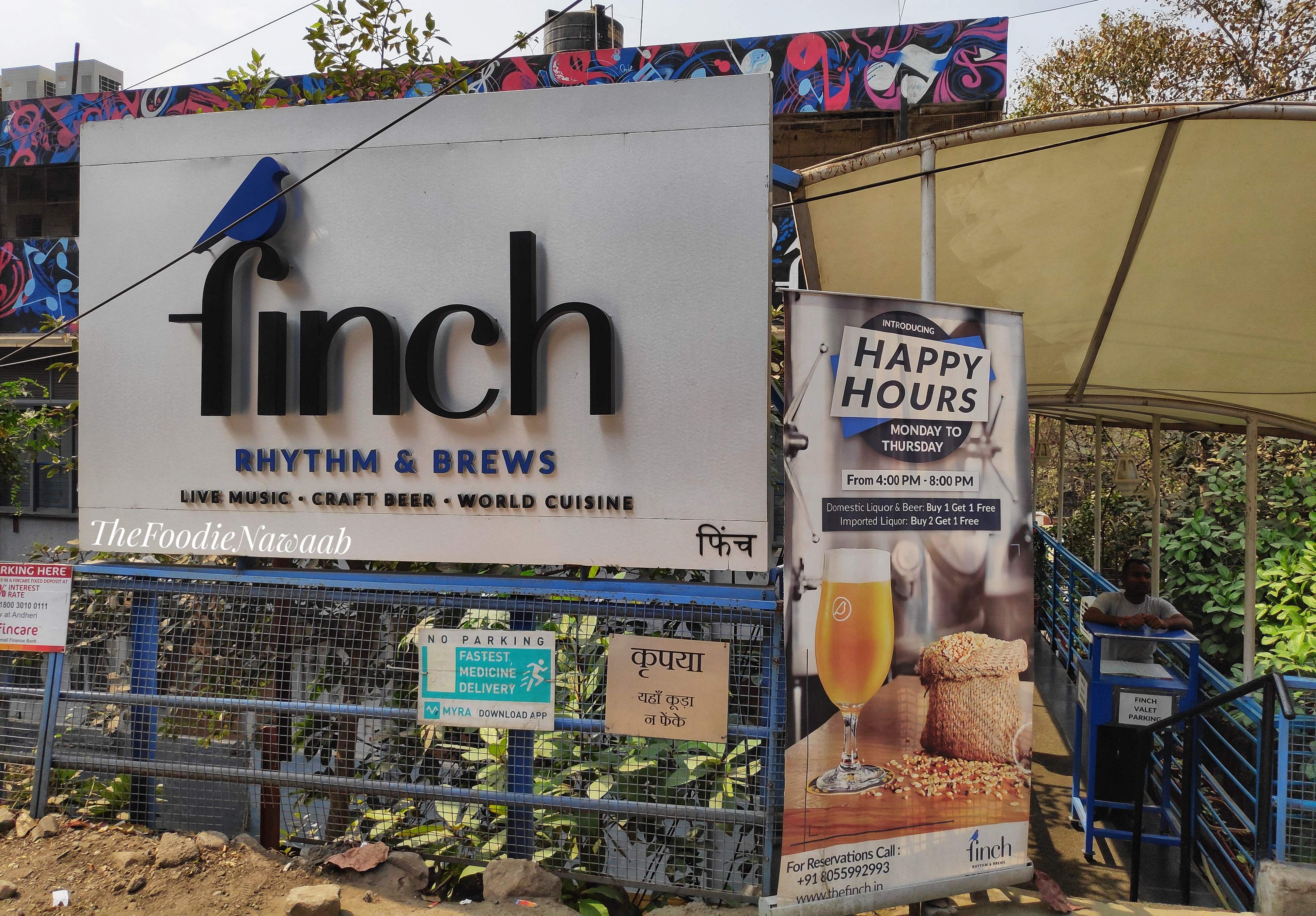 Advertising,Font,Neighbourhood,Building,House,Banner,Signage