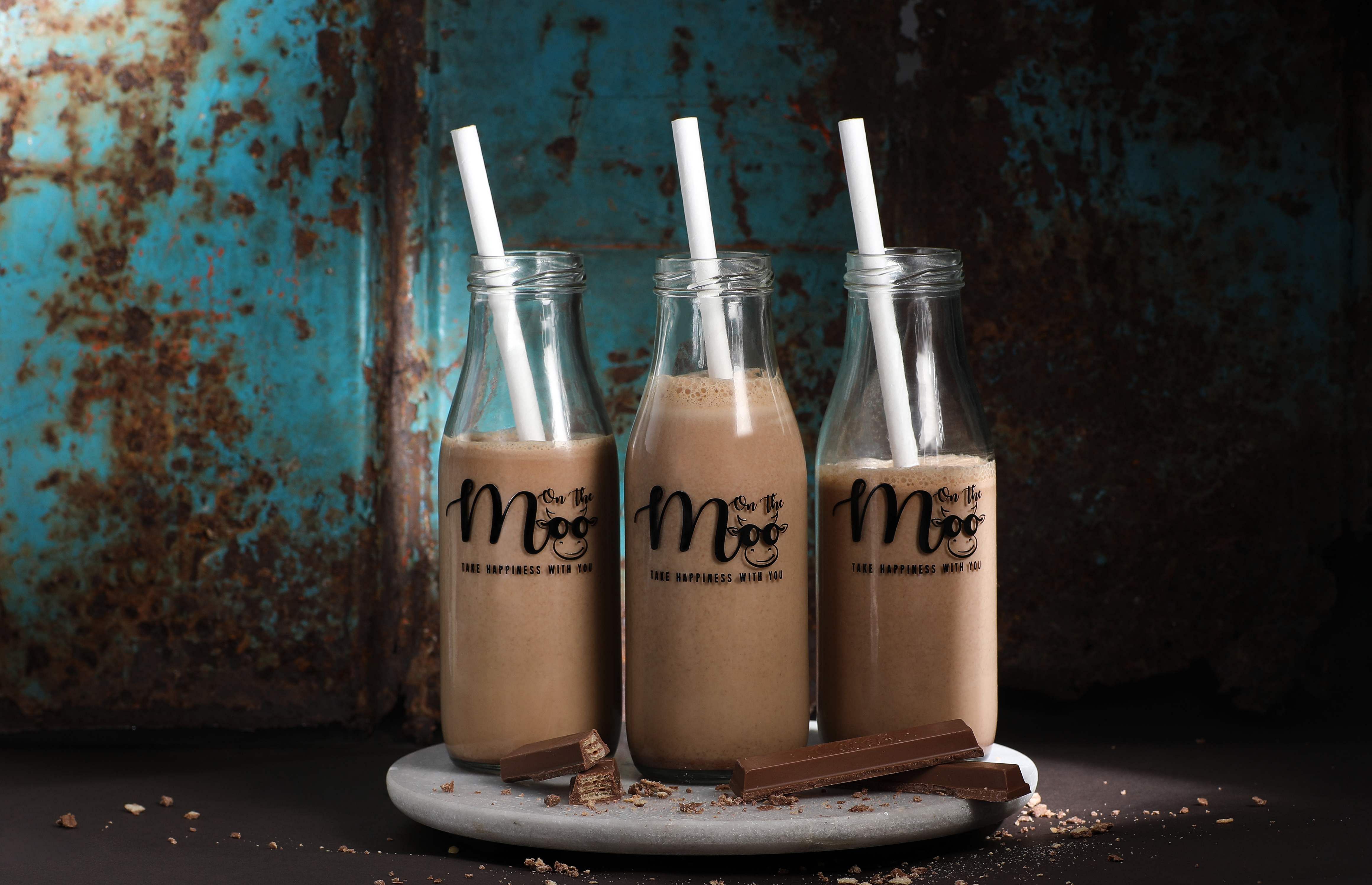 Product,Glass bottle,Bottle,Drink,Liquid,Font,Dairy,Glass