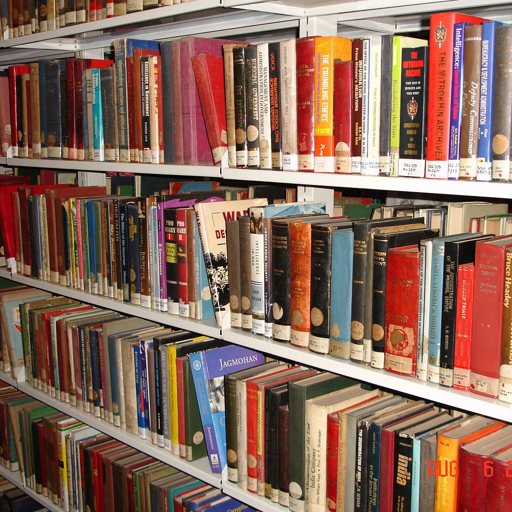 Shelving,Bookcase,Shelf,Book,Library,Publication,Bookselling,Public library,Furniture,Cyclone