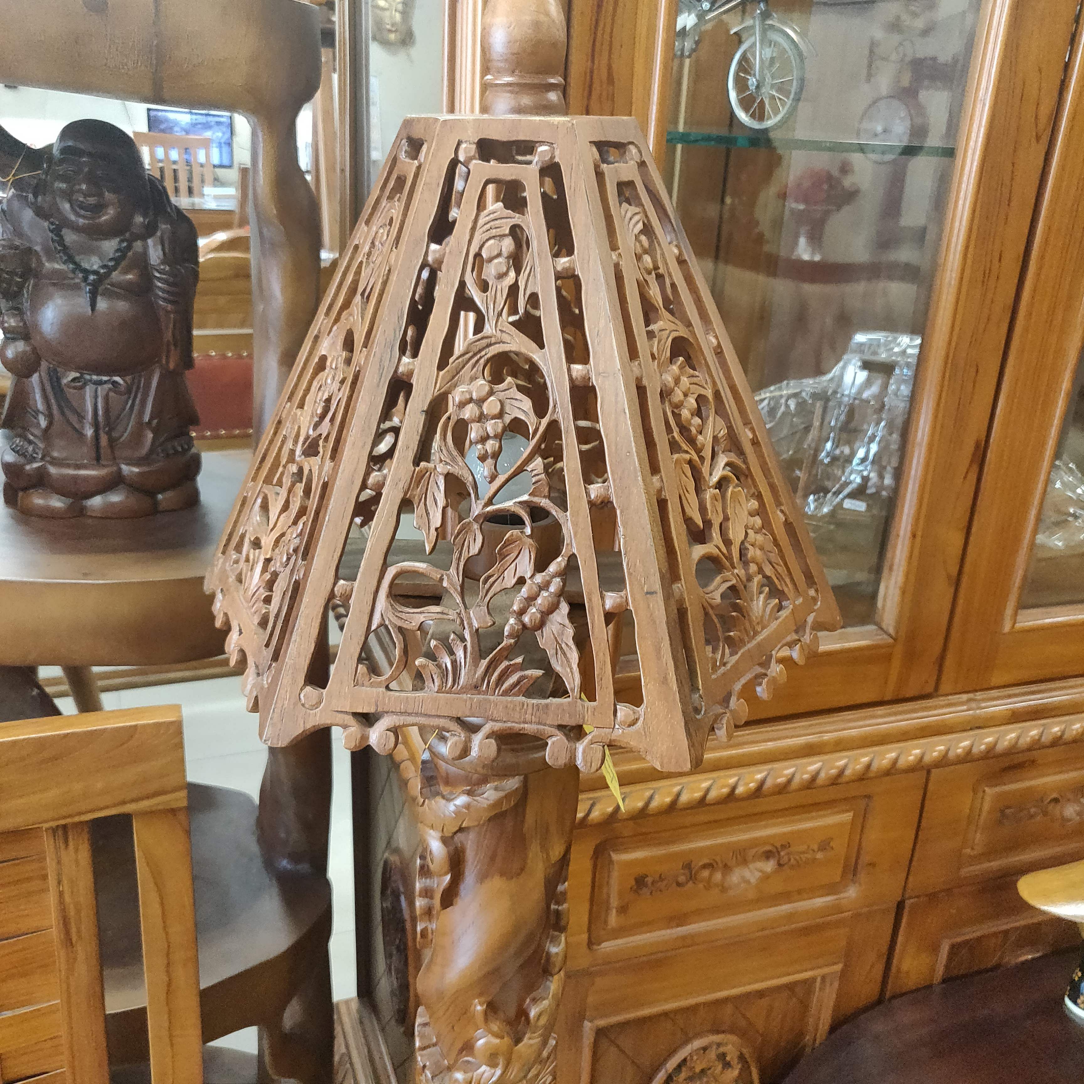 Furniture,Carving,Wood,Antique,Interior design,Light fixture,Table