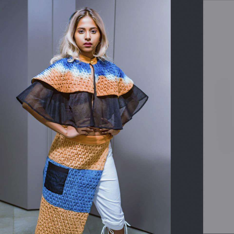 Clothing,Fashion,Turquoise,Orange,Shoulder,Outerwear,Costume,Silk,Fashion model,Textile