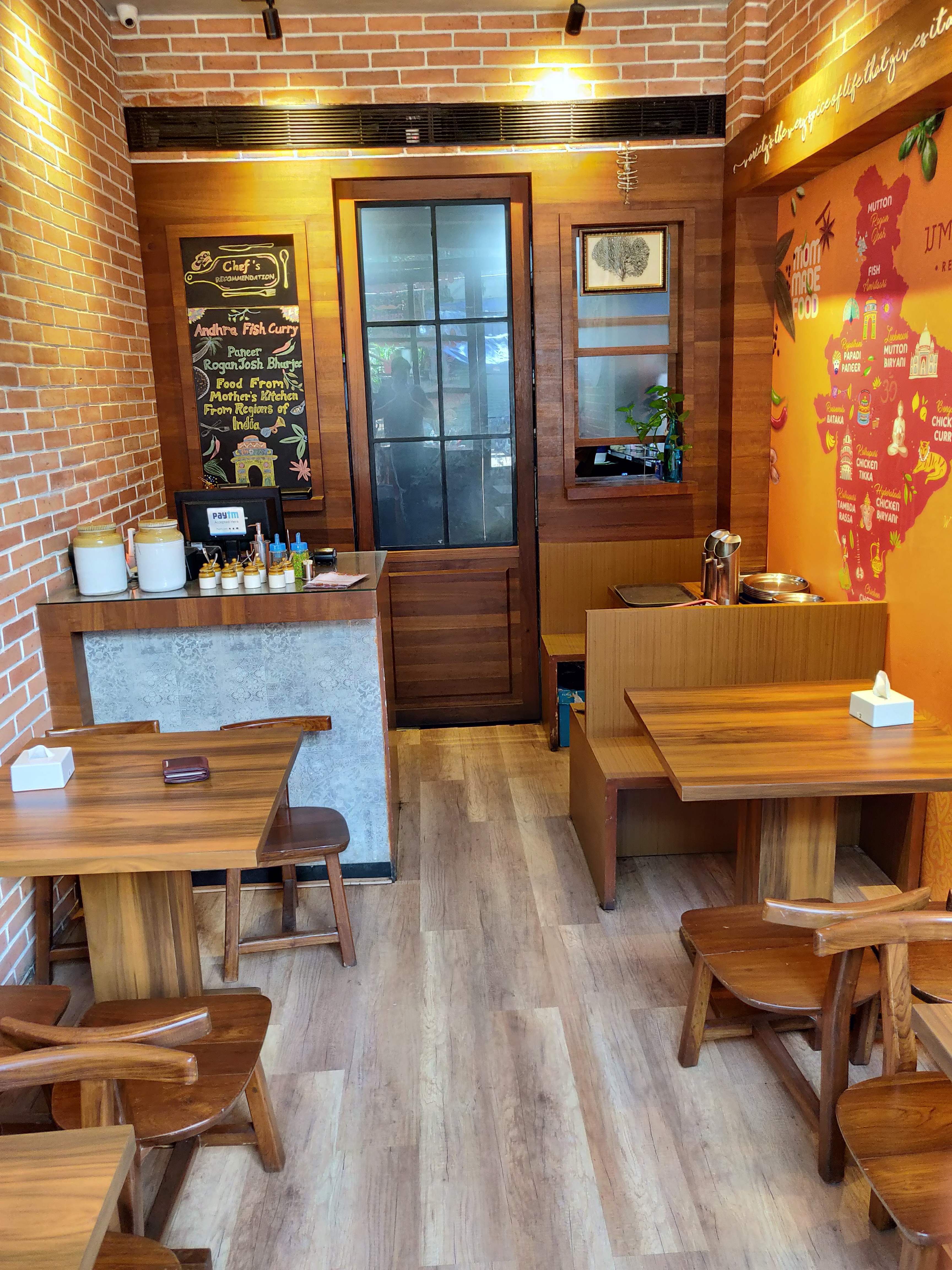 Room,Interior design,Building,Property,Restaurant,Furniture,Café,Table,Floor,House