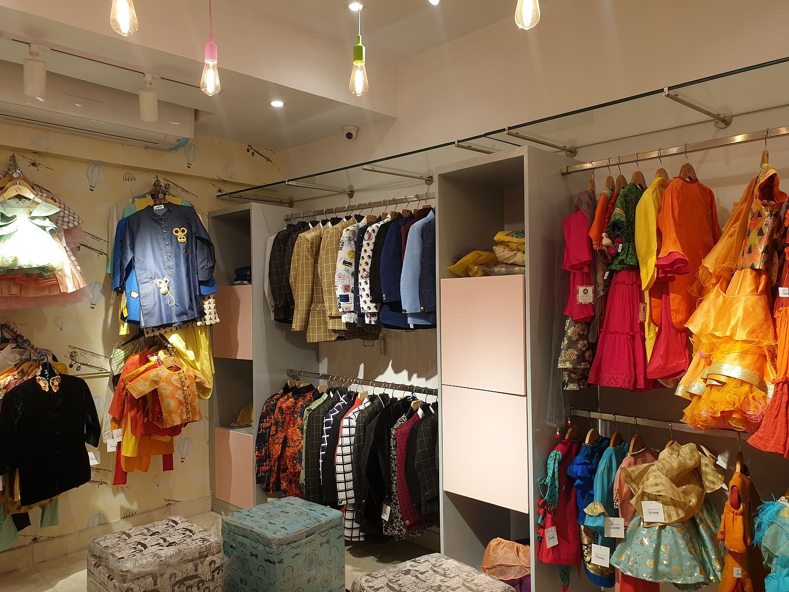 Boutique,Outlet store,Room,Fashion,Retail,Building,Textile,Closet,Interior design,Shopping