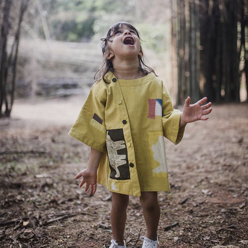 Clothing,Yellow,Outerwear,Street fashion,Raincoat,Coat,Jacket,Fashion,Sleeve,Footwear