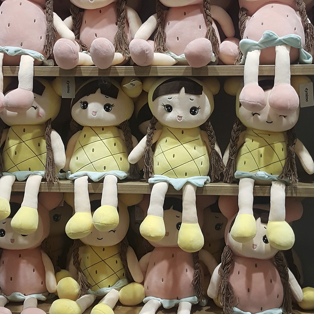 Toy,Stuffed toy,Plush,Yellow,Textile,Rabbit,Rabbits and Hares,Pattern,Animation,Happy