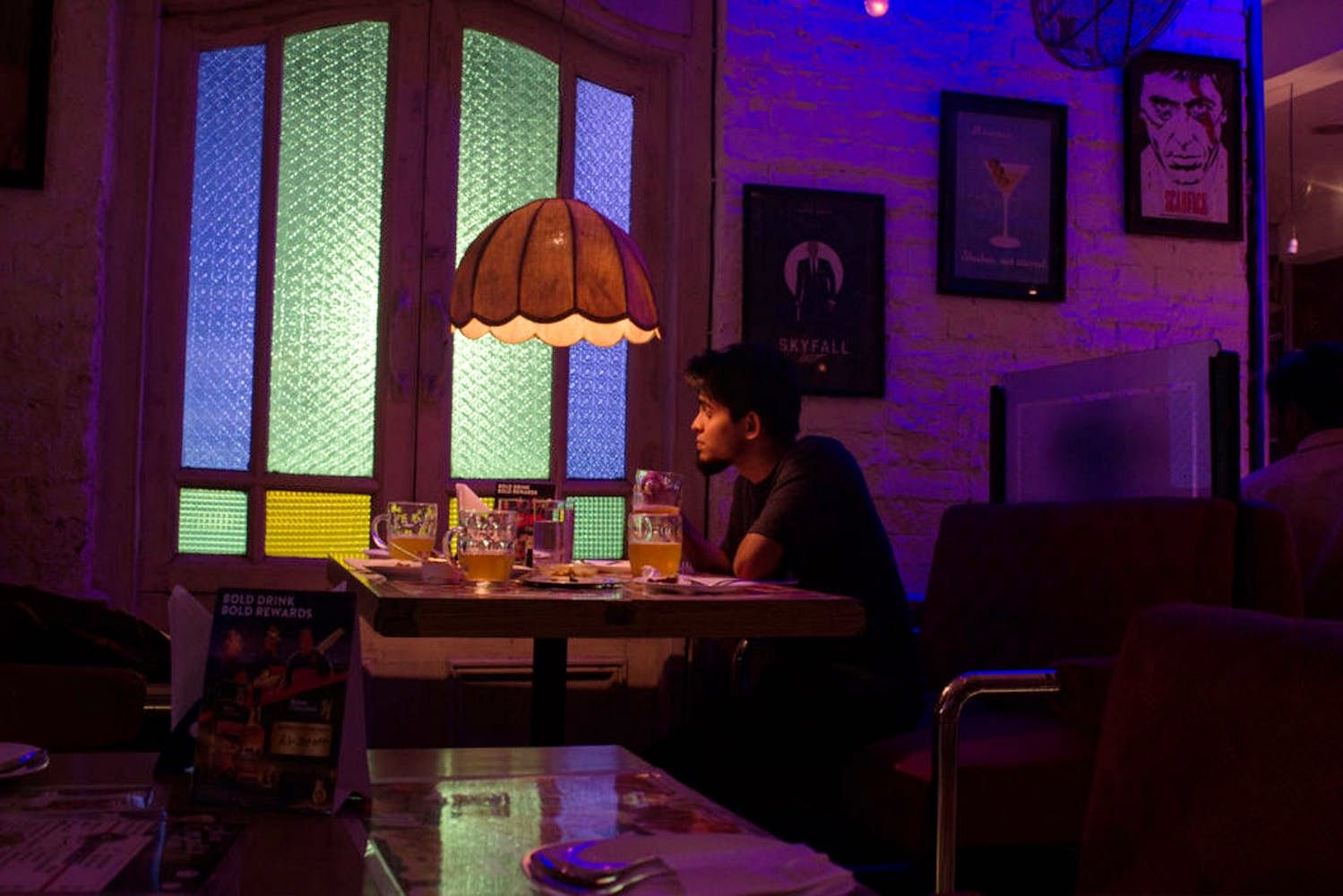 Light,Purple,Lighting,Room,Restaurant,Table,Interior design,House,Furniture,Night