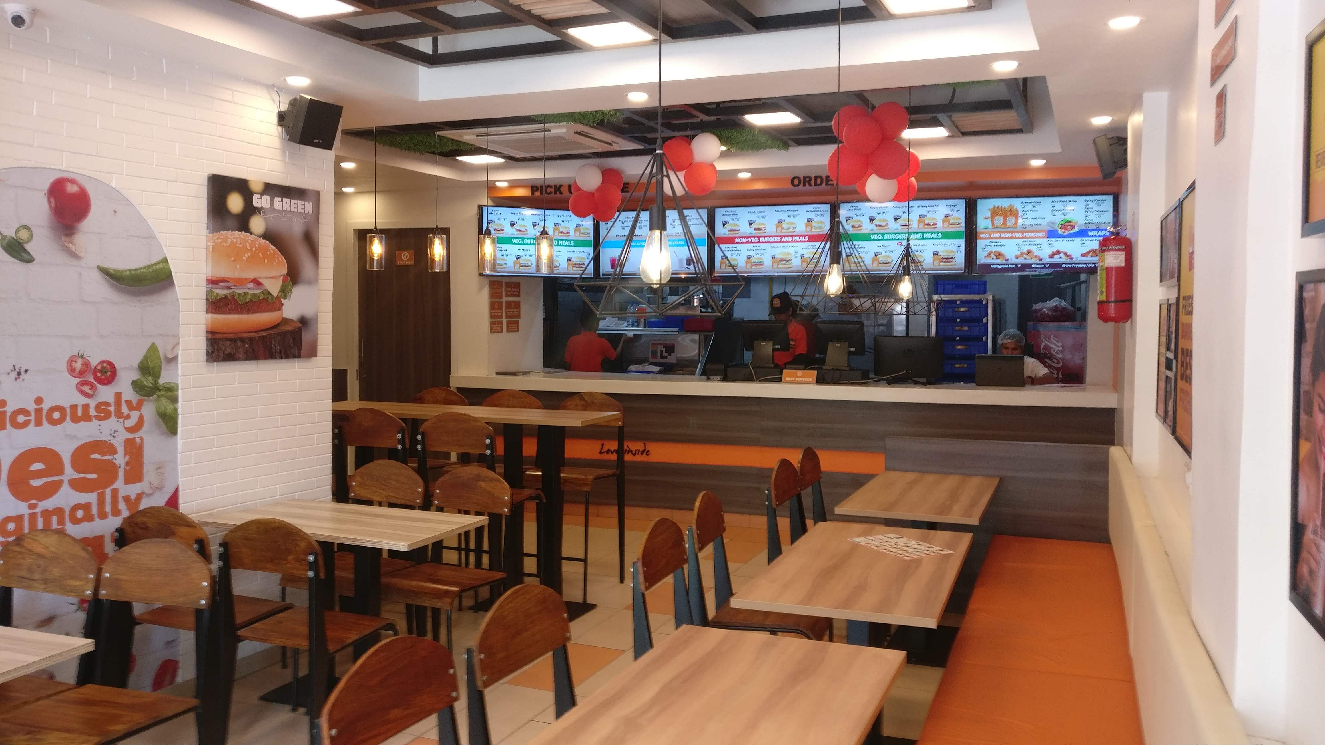 Restaurant,Building,Fast food restaurant,Café,Food court,Cafeteria,Room,Interior design,Fast food,Diner