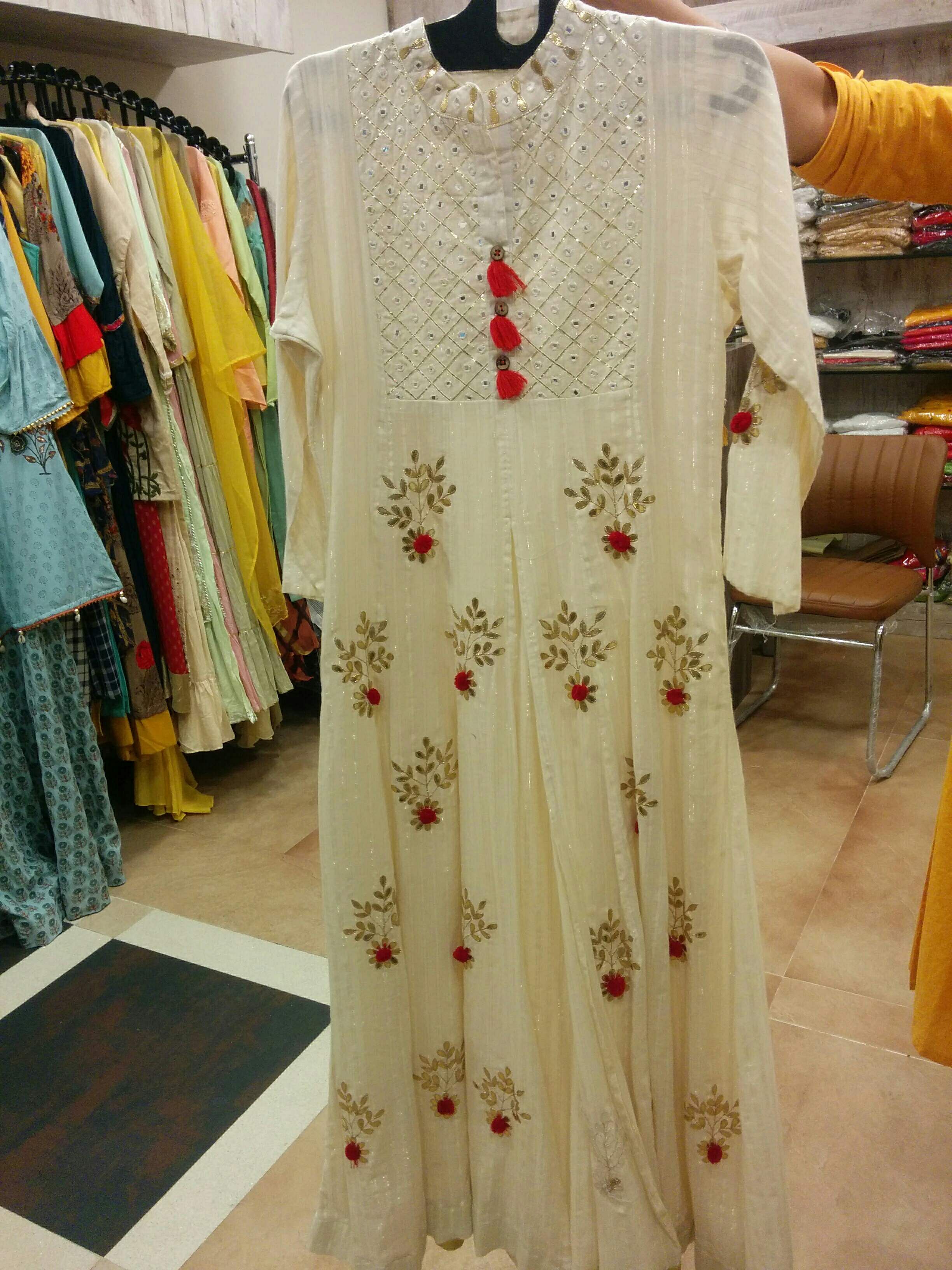 Clothing,White,Dress,Boutique,Formal wear,Fashion,Outerwear,Embroidery,Gown,Fashion design