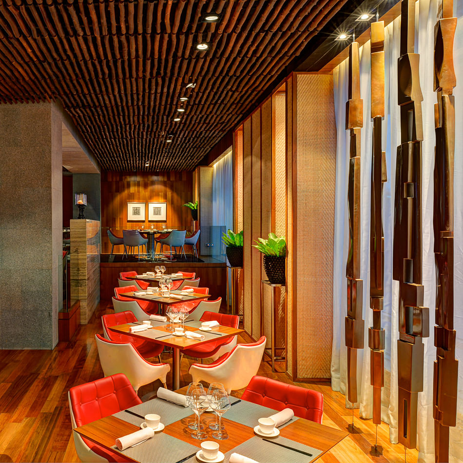 Restaurant,Interior design,Room,Building,Orange,Dining room,Ceiling,Table,Furniture,Architecture